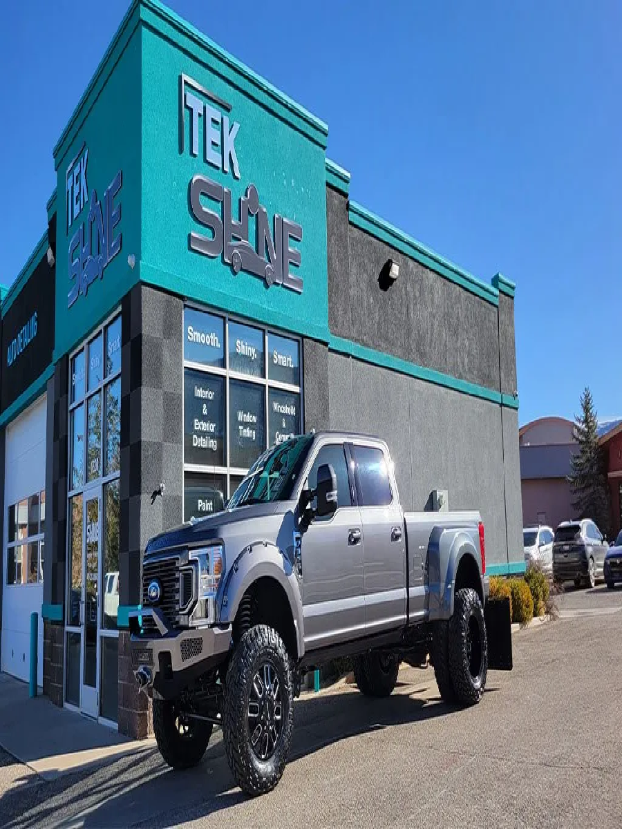 Ford truck outside Tek Shine detailing shop for pro vs DIY comparison