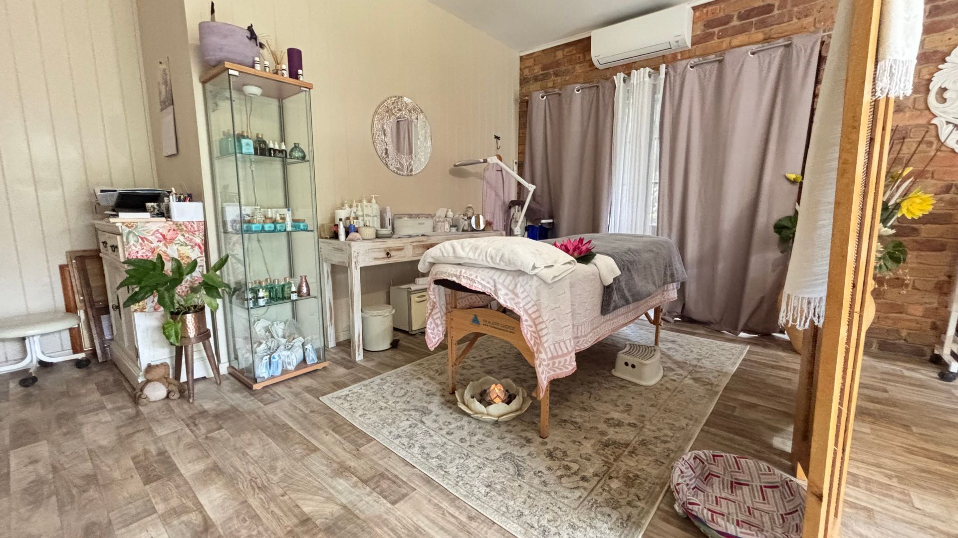 A Woman Is Getting A Facial Treatment At A Spa — Beauty Abode in Buderim, QLD