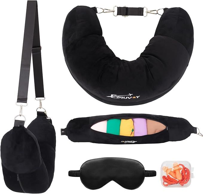 A black u shaped pillow with a shoulder strap