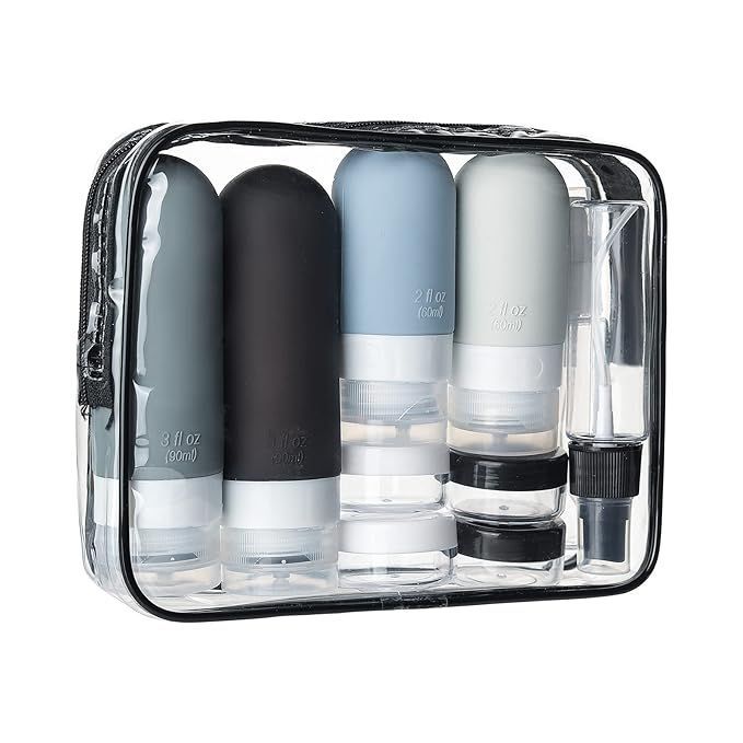 A clear plastic bag filled with bottles and spray bottles.