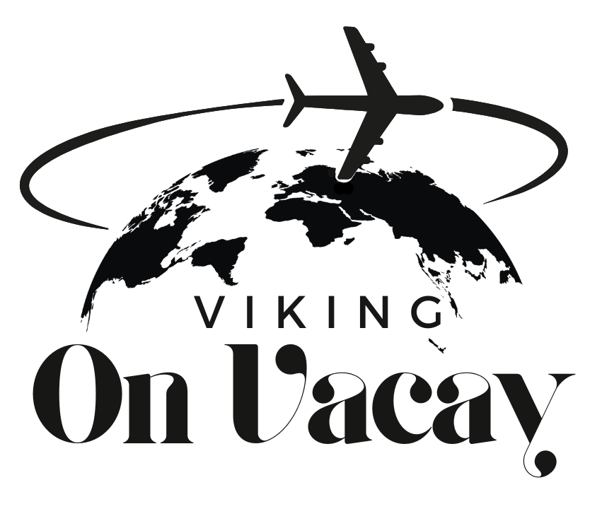 A black and white logo for viking on vacay