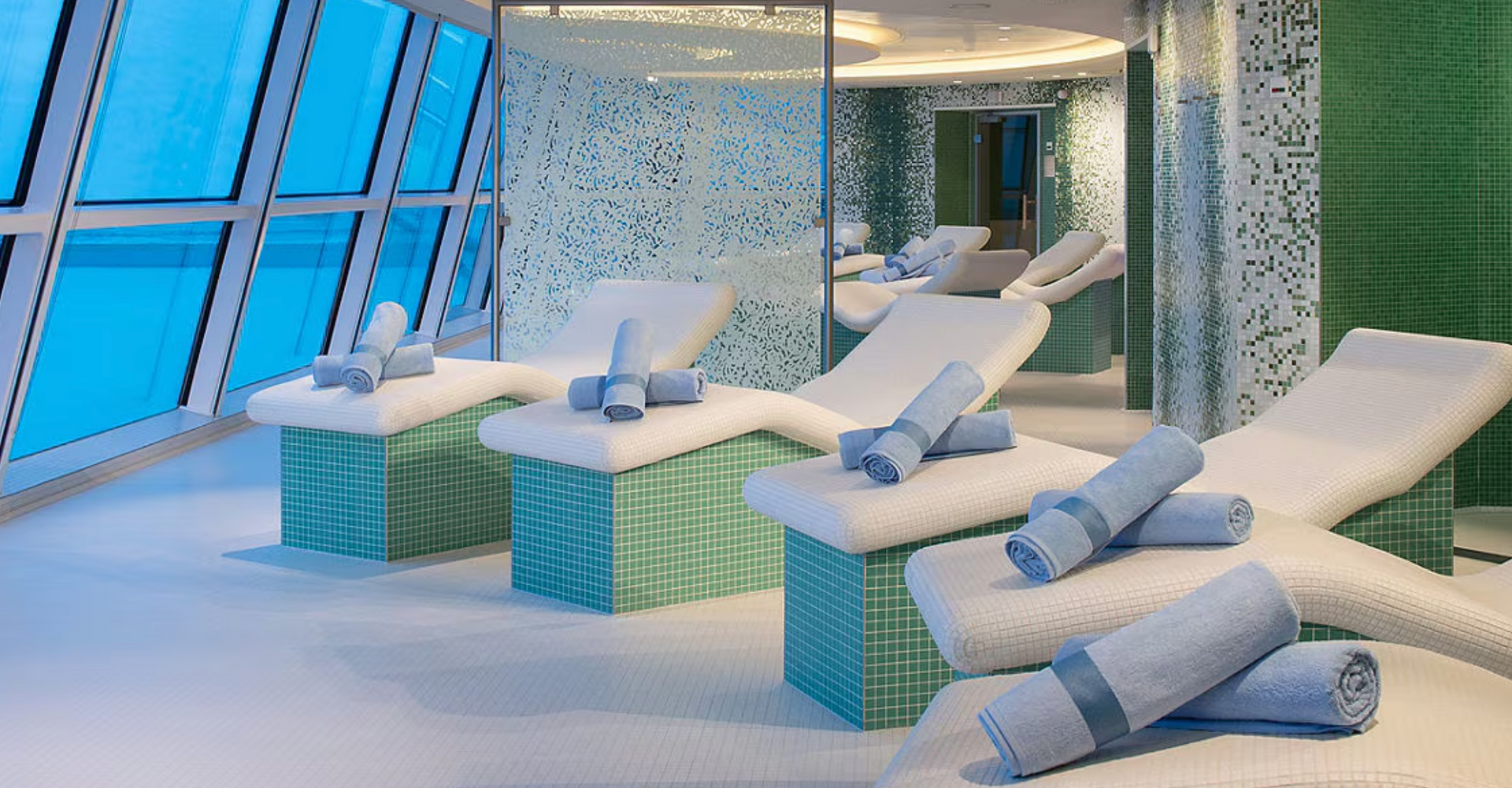 There are a lot of chairs and towels in the spa on the Celebrity Reflection cruise ship.