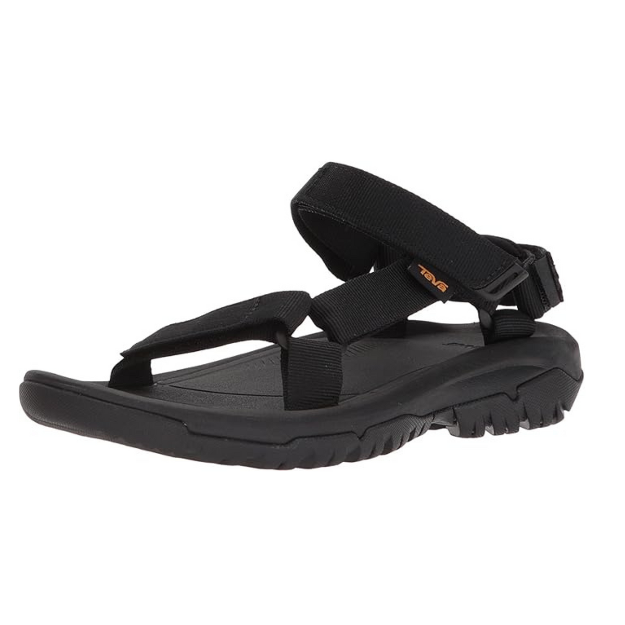 A pair of black teva sandals on a white background