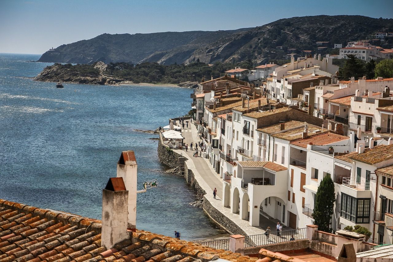 An aerial view of Cadaqués next to the ocean in Spain.