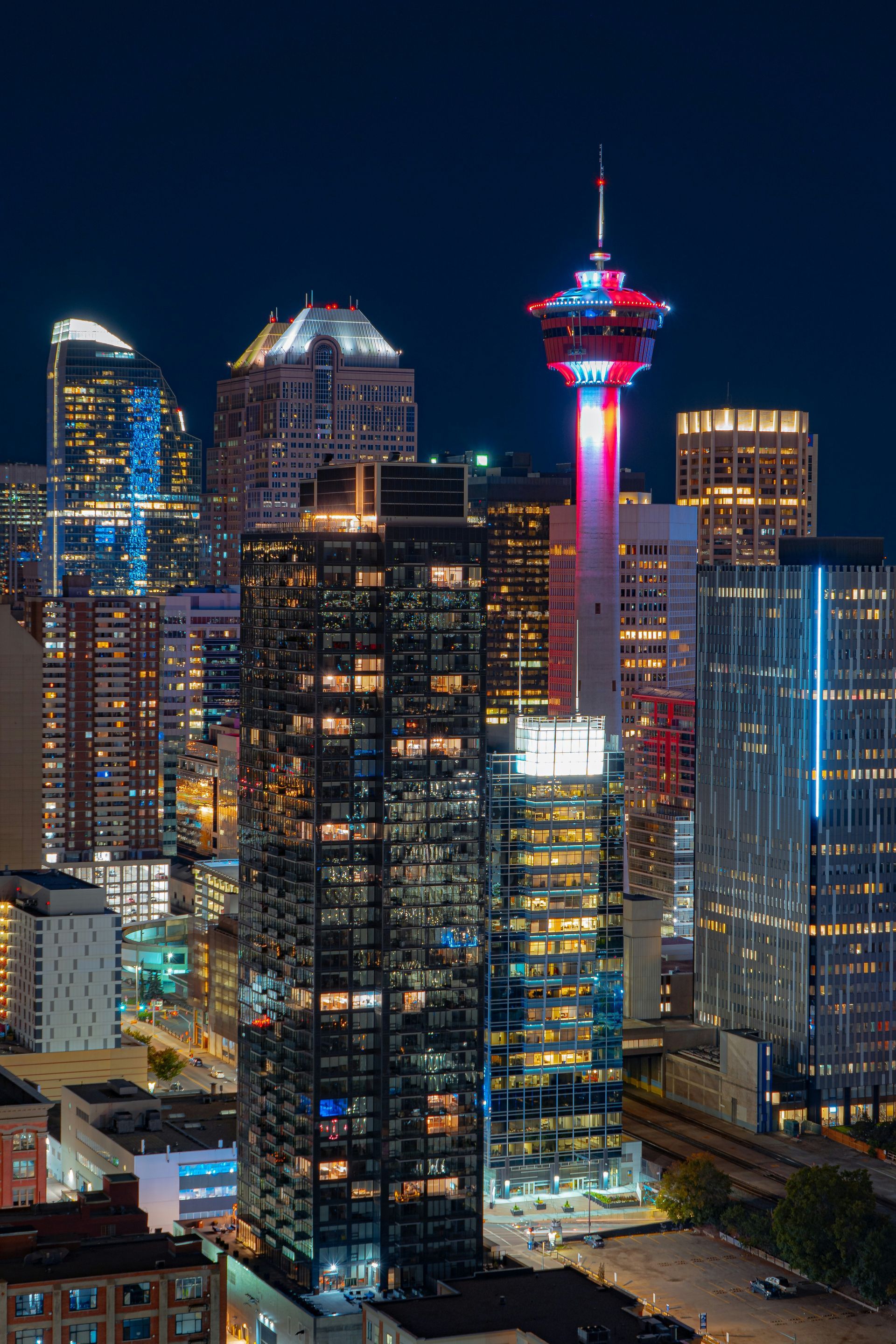 Nighttime view of Calgary's skyline, with the illuminated Calgary Tower.