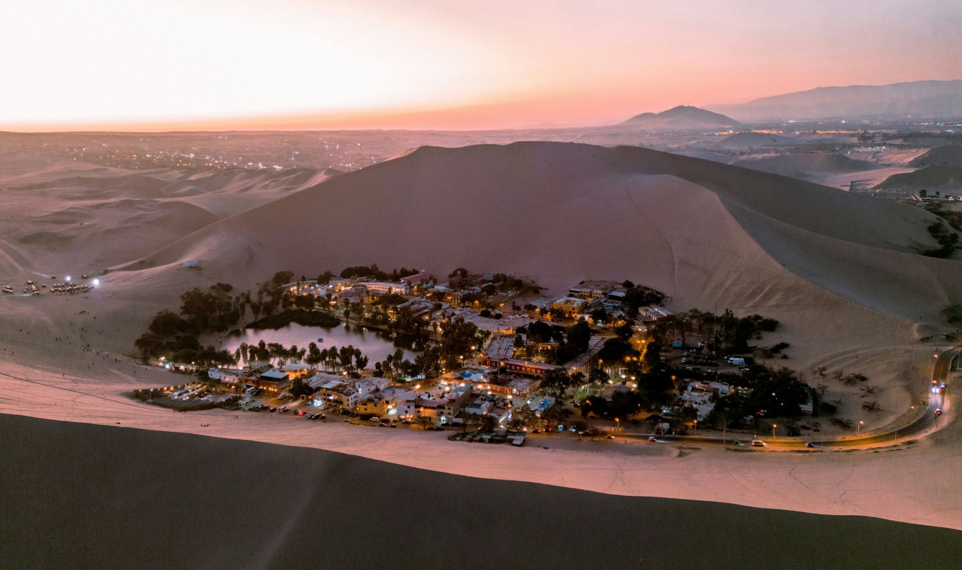The village of Huacachina, Peru is sitting on top of a sand dune in the middle of the desert.