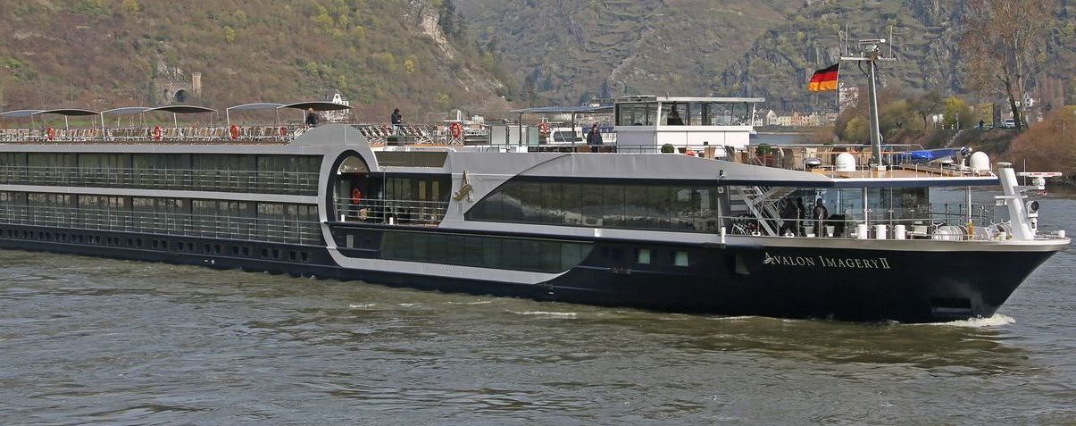 The Avalon Imagery II cruise ship is floating on top of a body of water.