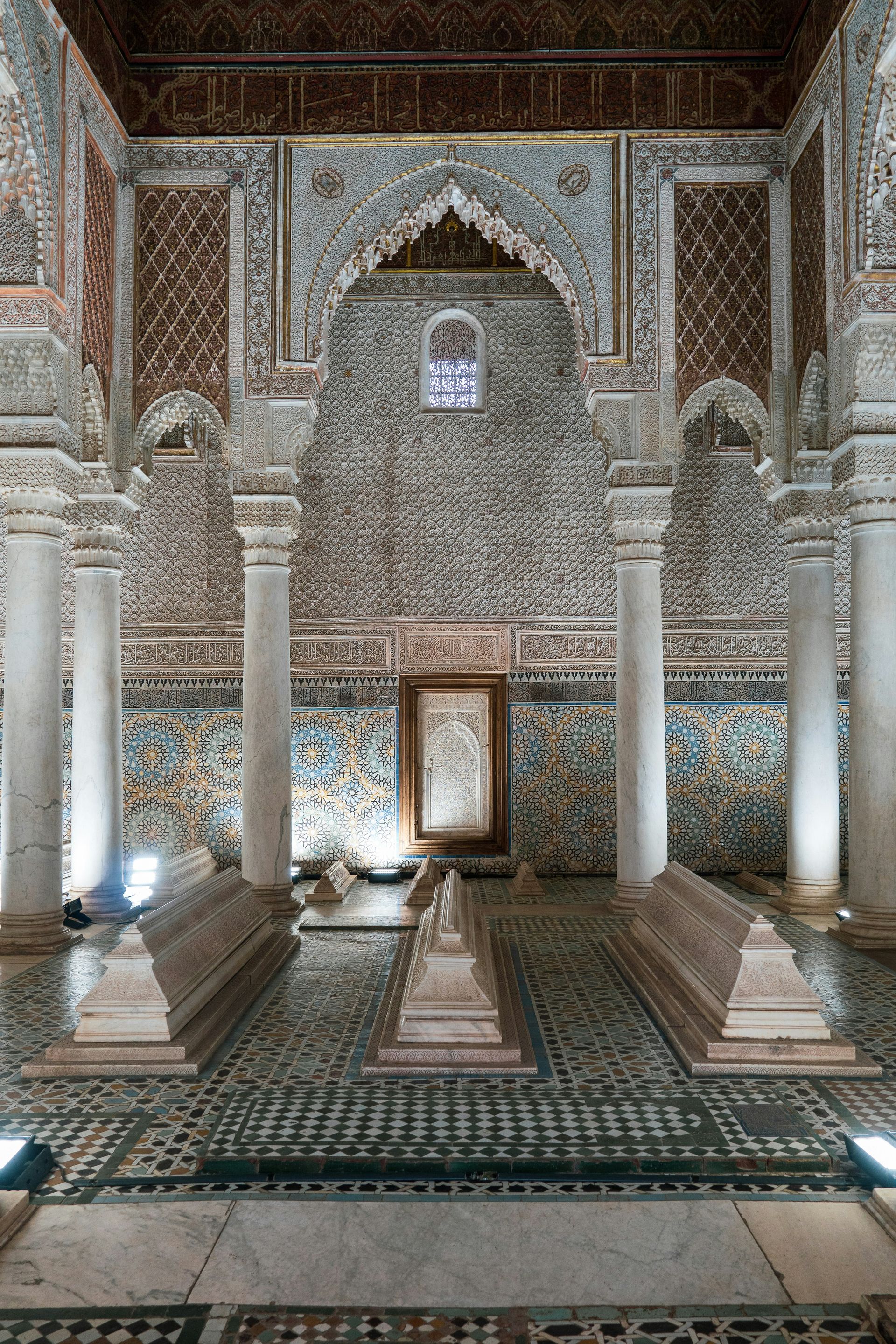 A room with columns and a statue in the middle of it in Marrakesh, Morocco.