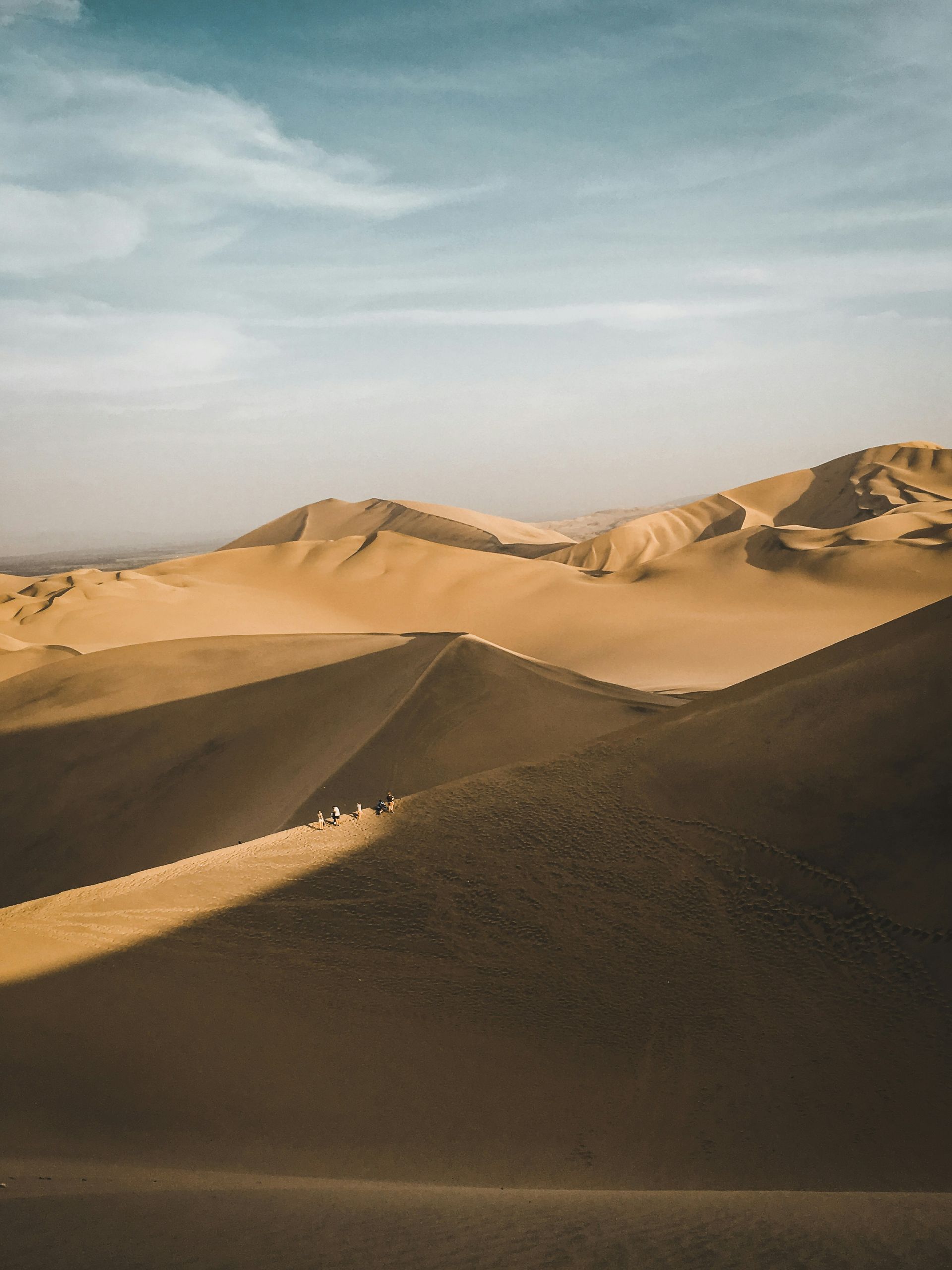 A sand dune in the desert of Huacachina, Peru.