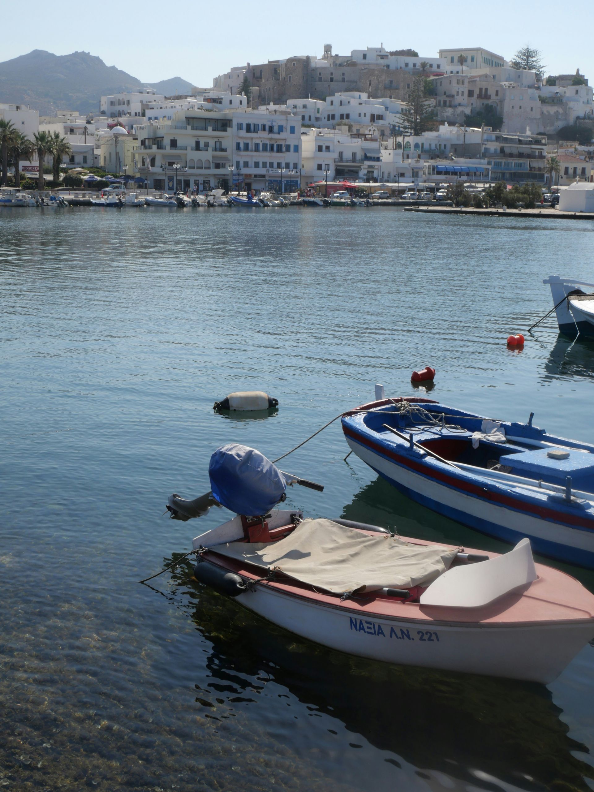 A boat with the name vega on the side of it in Naxos, Greece.