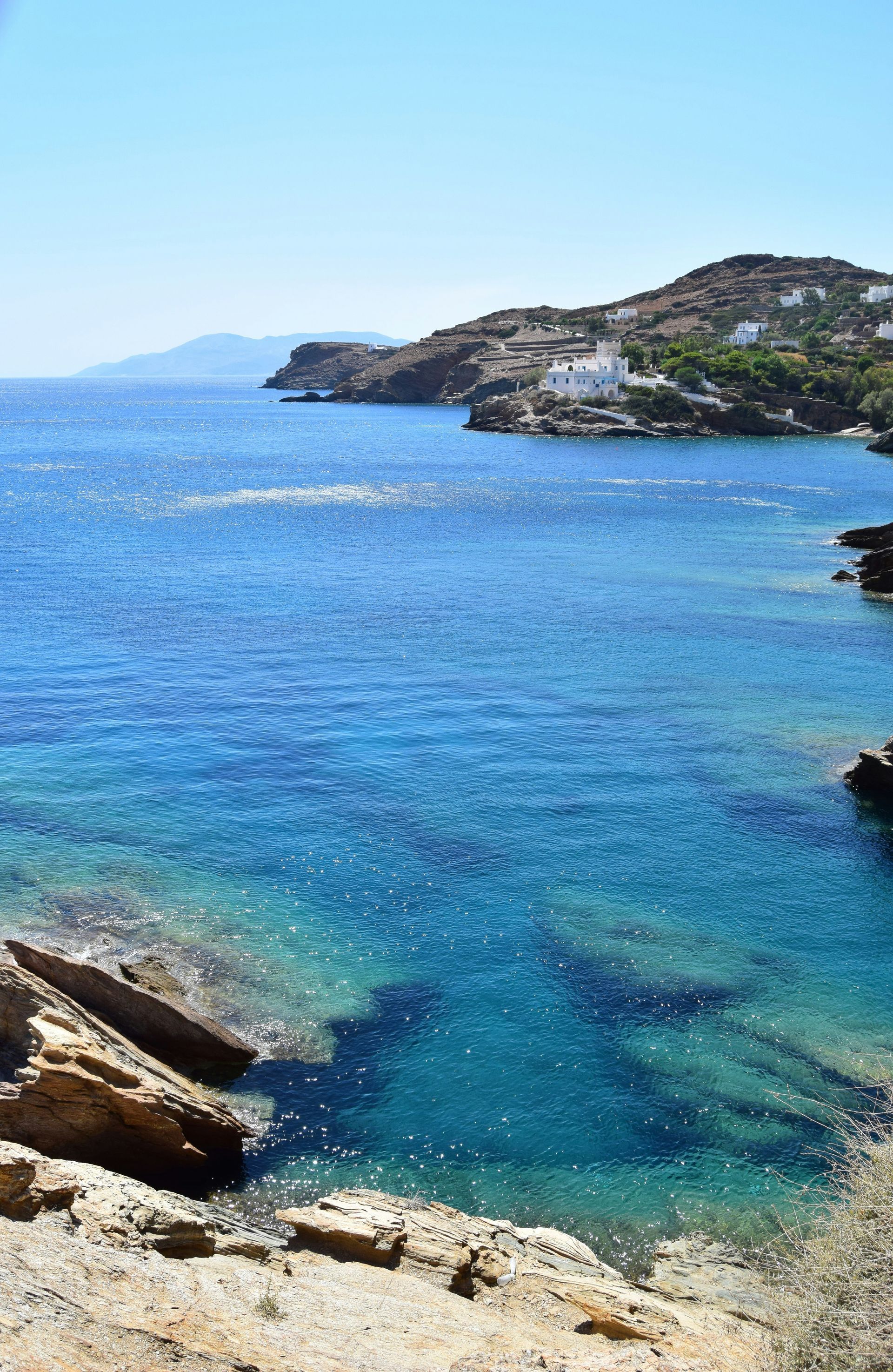 A small island in the middle of a large body of water in Ios, Greece,