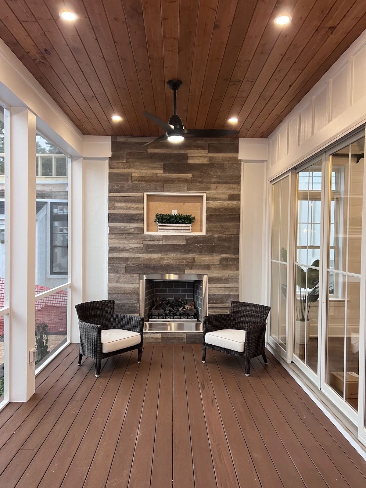 Outdoor screen porch featuring premium finishes