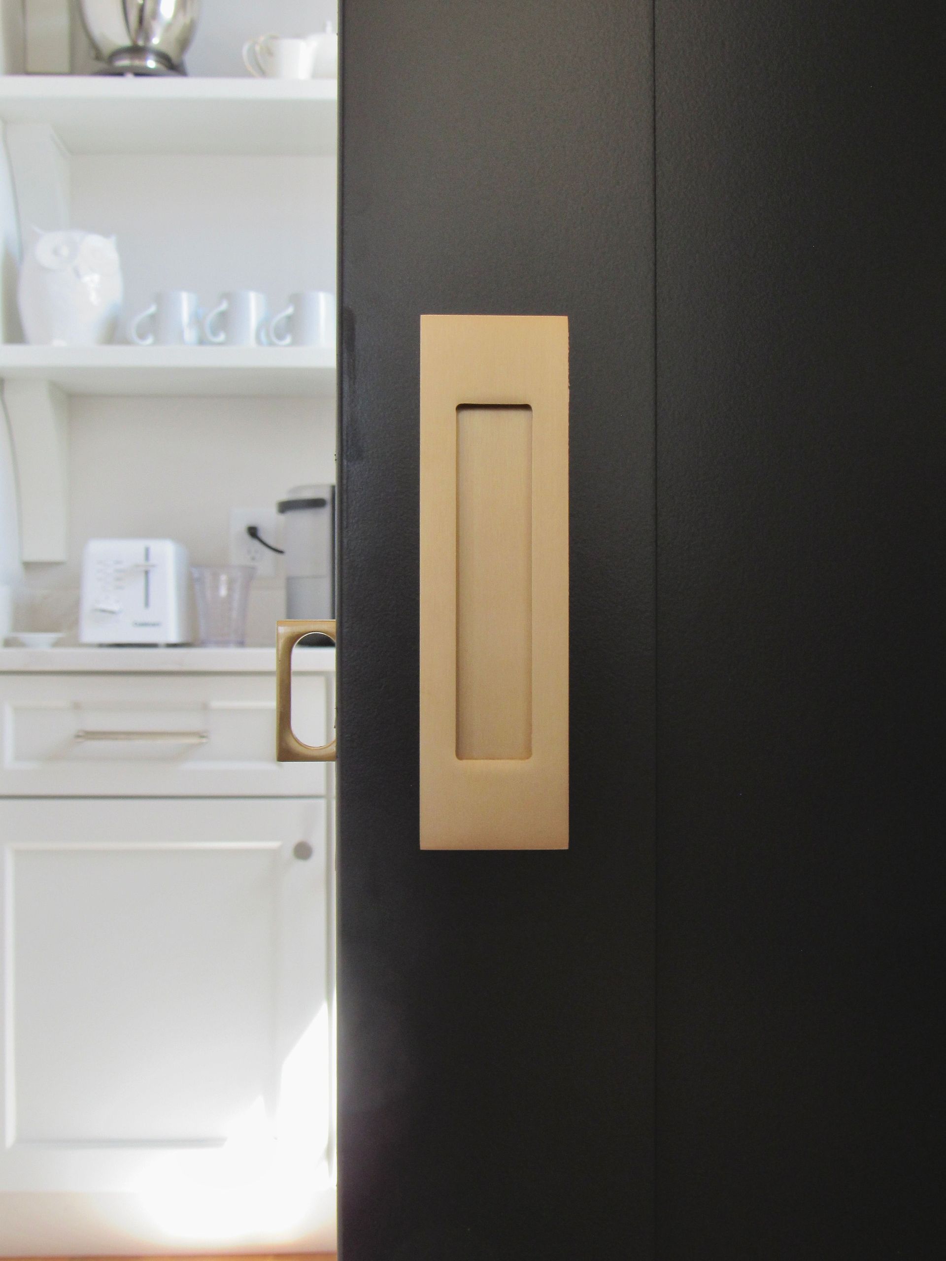 Pocket door Luxury custom home built by Oak Construction in Rehoboth Beach Yacht Club, RBYCC, Delaware