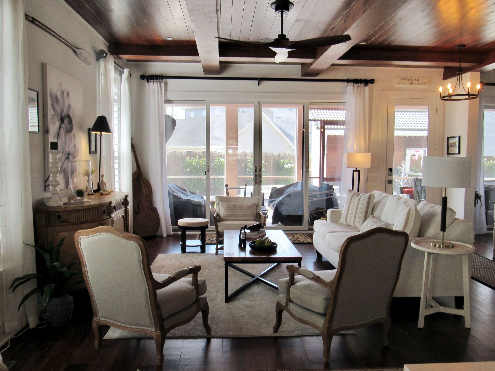 Look through the windows in family Room that is spacious with custom architectural details