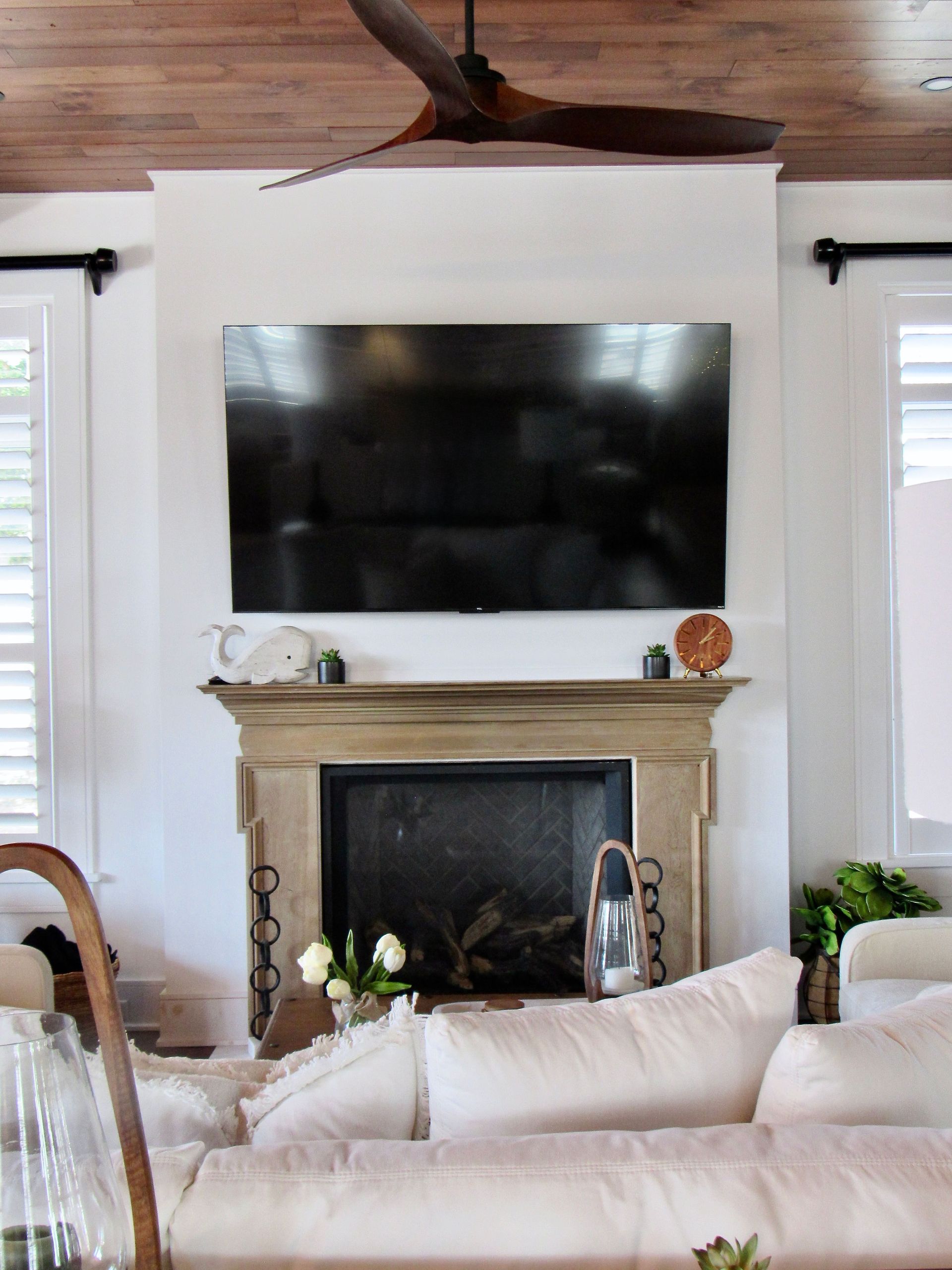 Family room wood ceilings with fireplace  in a custom home built by Matt Purnell Oak Construction Company Lewes Delaware