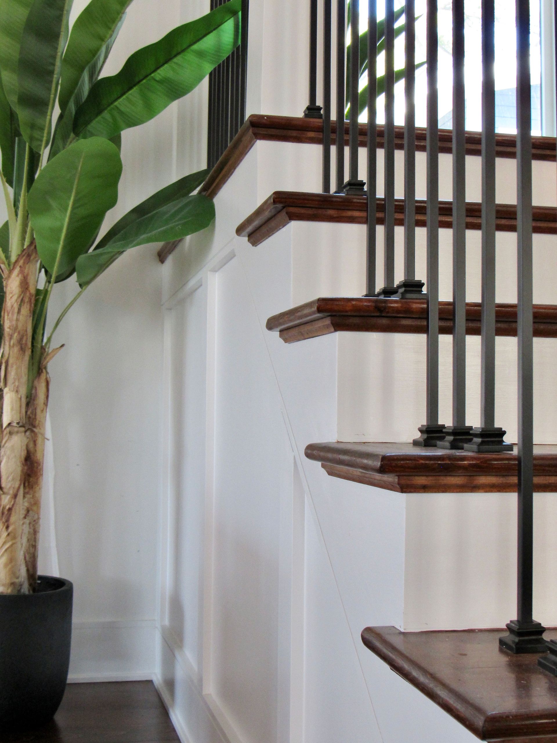 Stairs  in a coastal custom home by Oak Construction