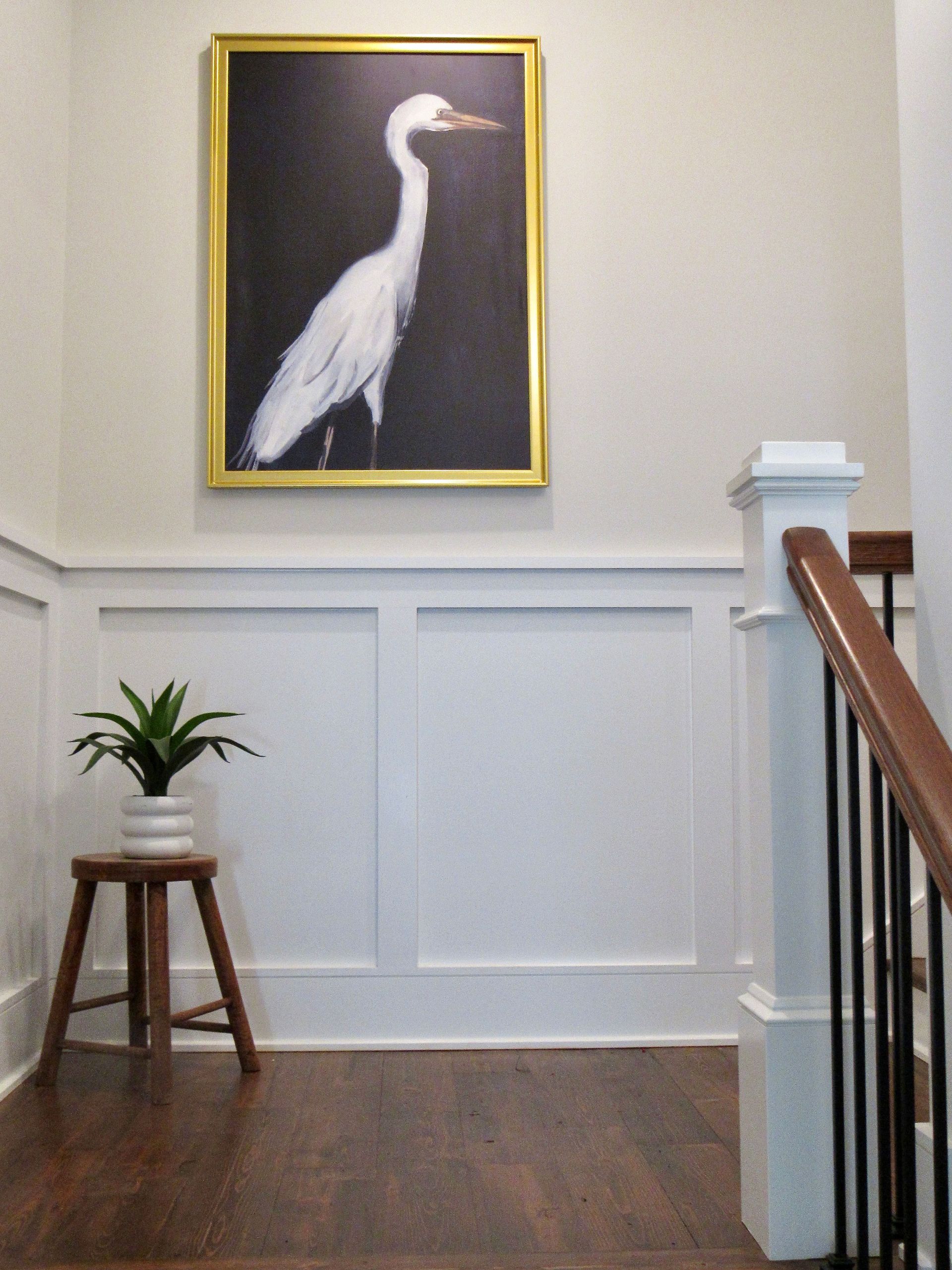 Stairway of  coastal custom home by Oak Construction