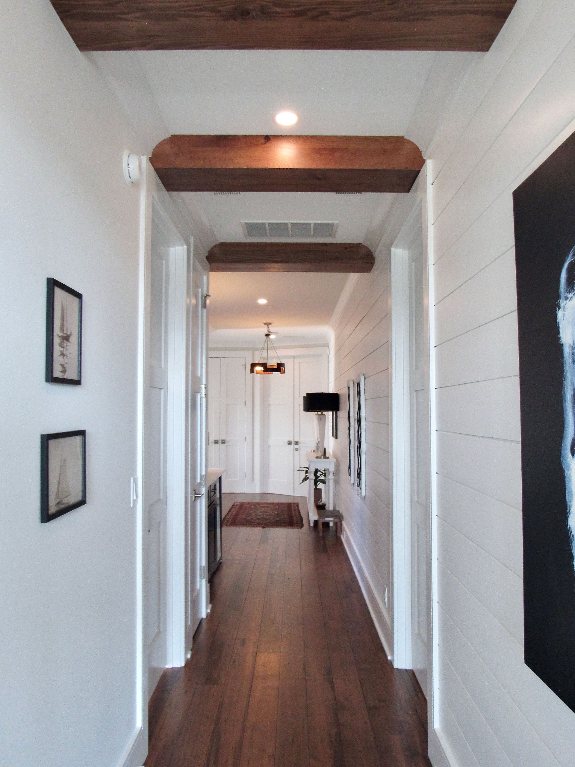 Hallway of  coastal custom home by Oak Construction