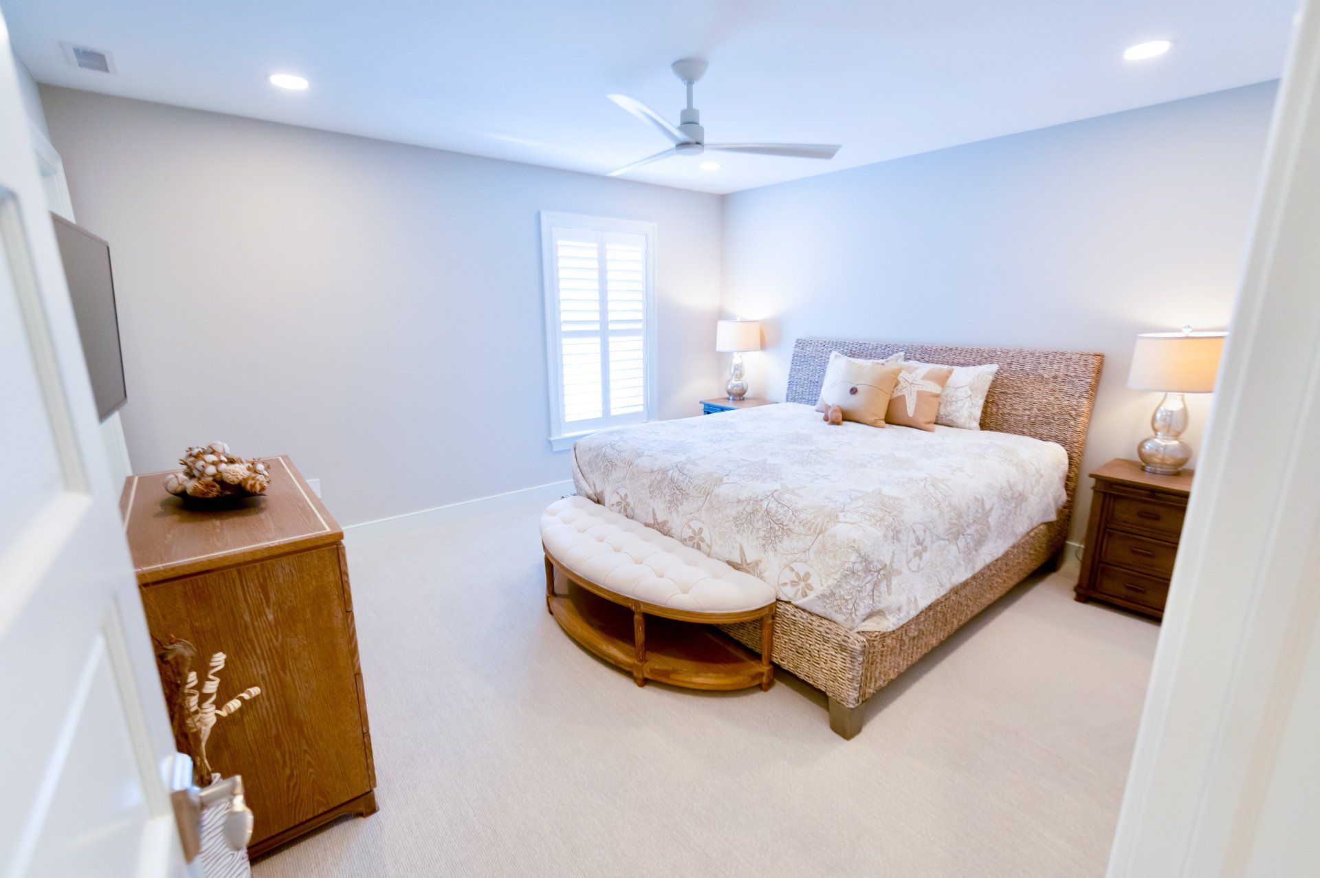 Elegant custom home designed and built by Oak Construction Primary Bedroom