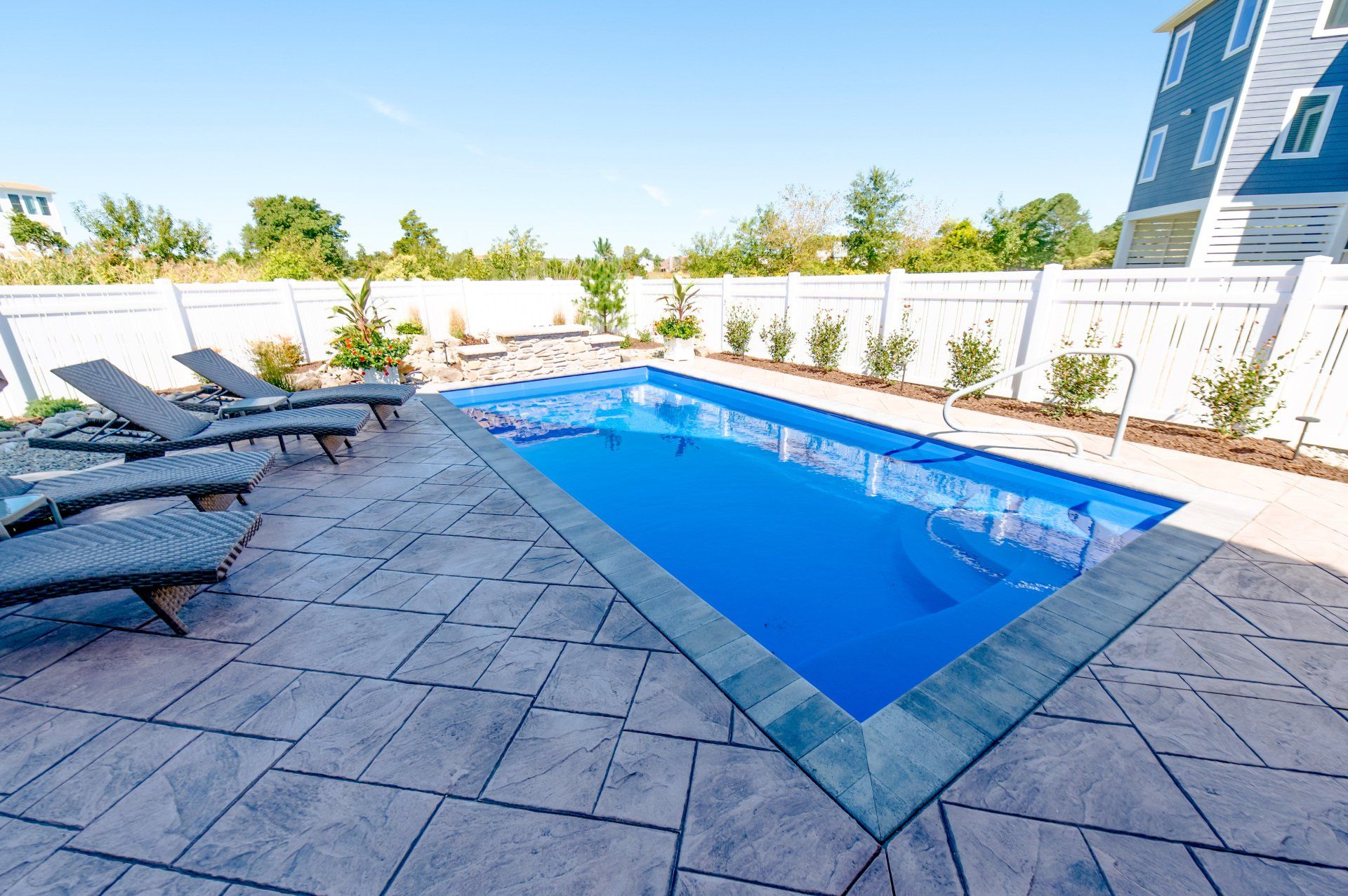 Elegant custom home designed and built by Oak Construction outdoor pool