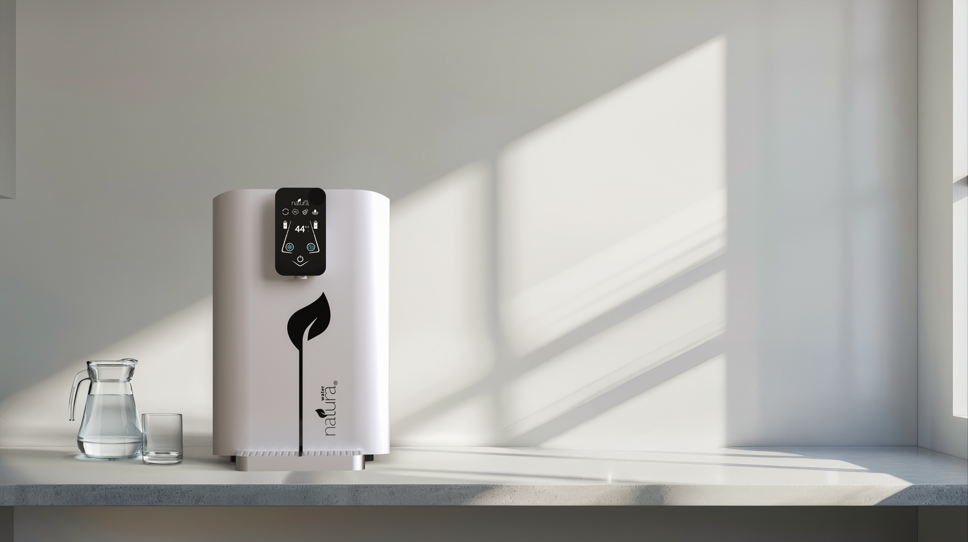 White water purifier with leaf design and control panel, next to a glass of water.