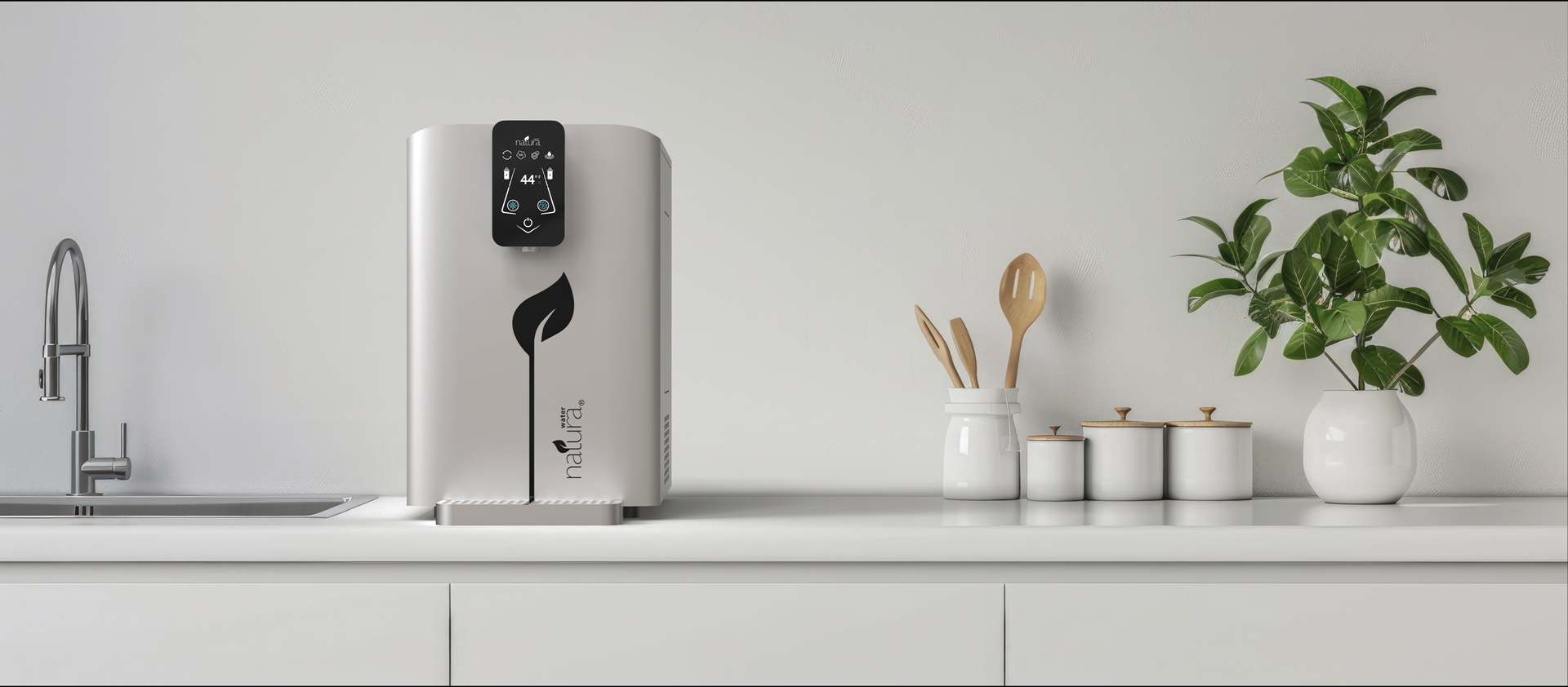 A white kitchen counter with a water purifier, plant, jars, and faucet.