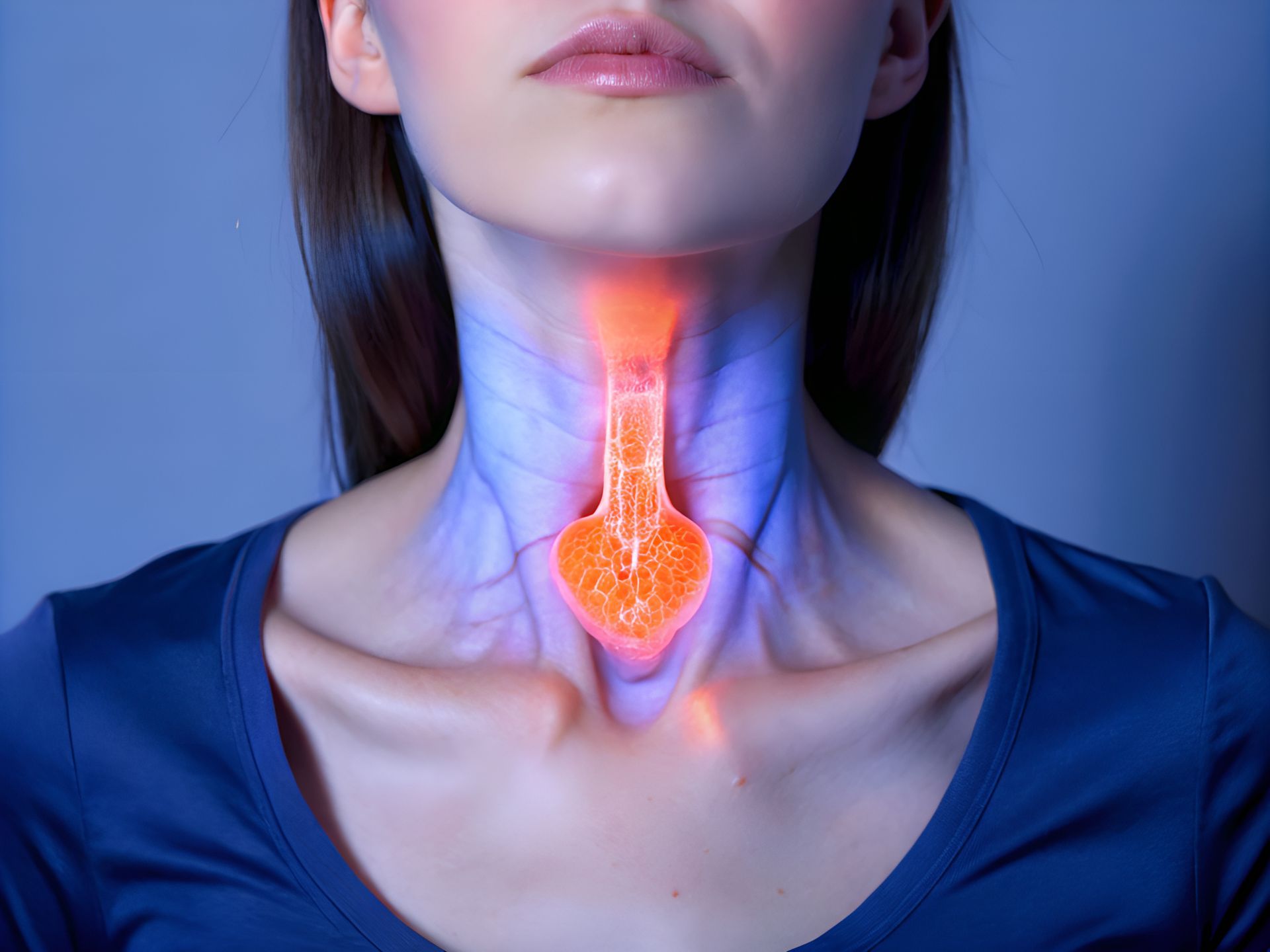 Médico realizando ablação por radiofrequência guiada por ultrassom em paciente com nódulo de tireoide benigno, sem necessidade de cirurgia.