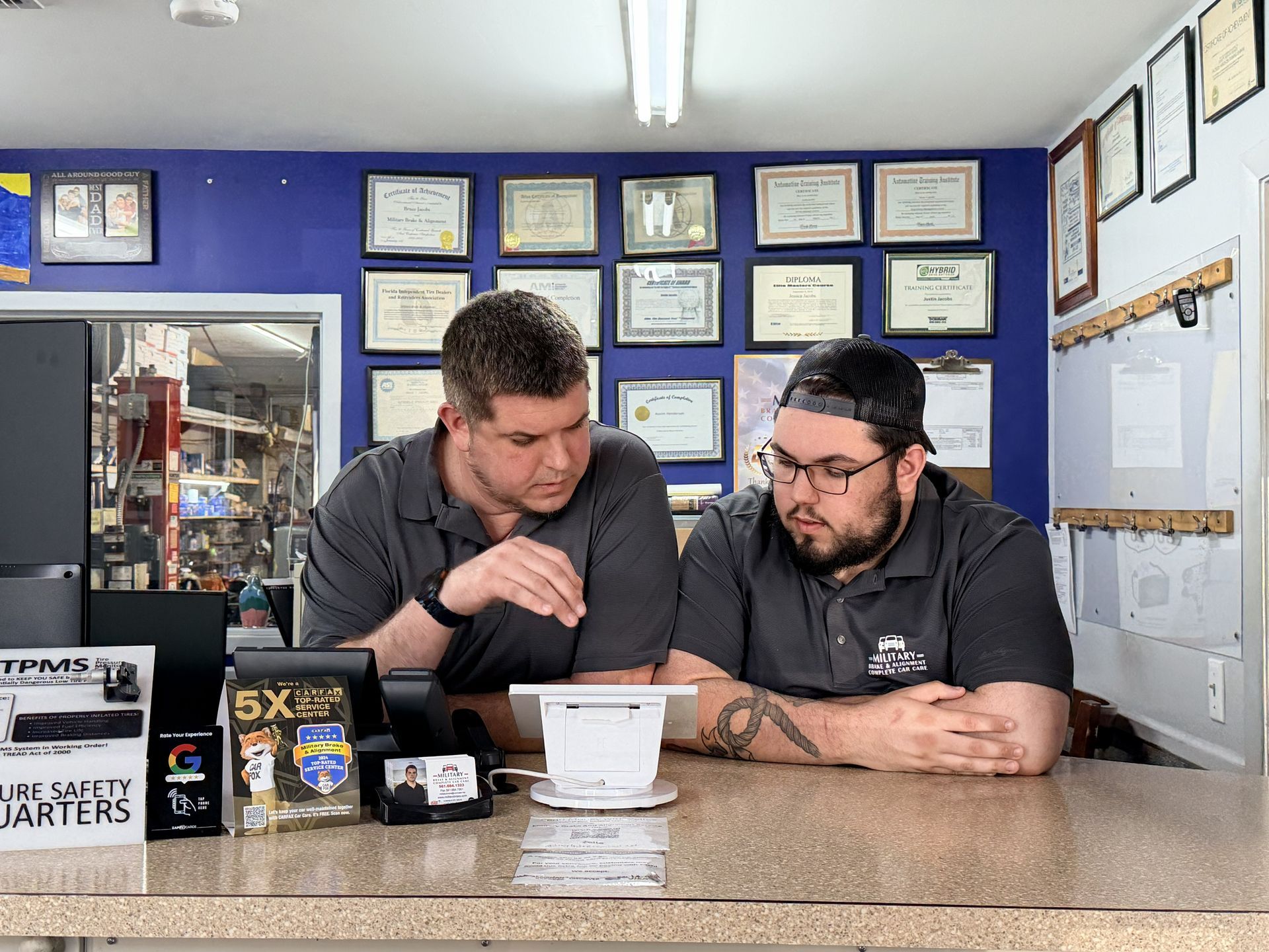 Owner and his son | Military Brake & Alignment Services Inc.