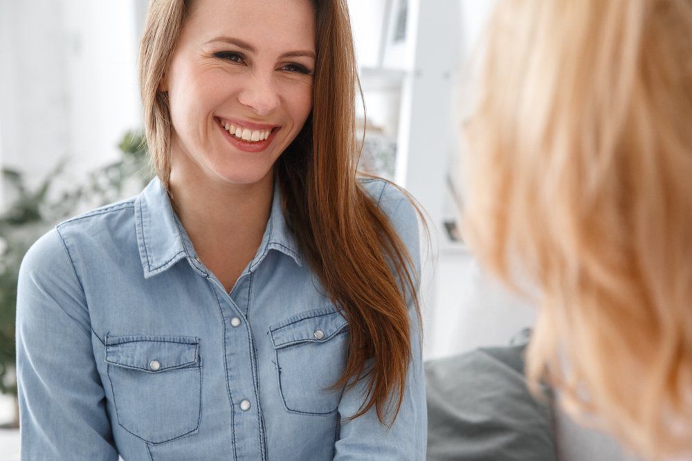 Woman Talking to Her Dentist — Dentistry Services in Cairns, QLD