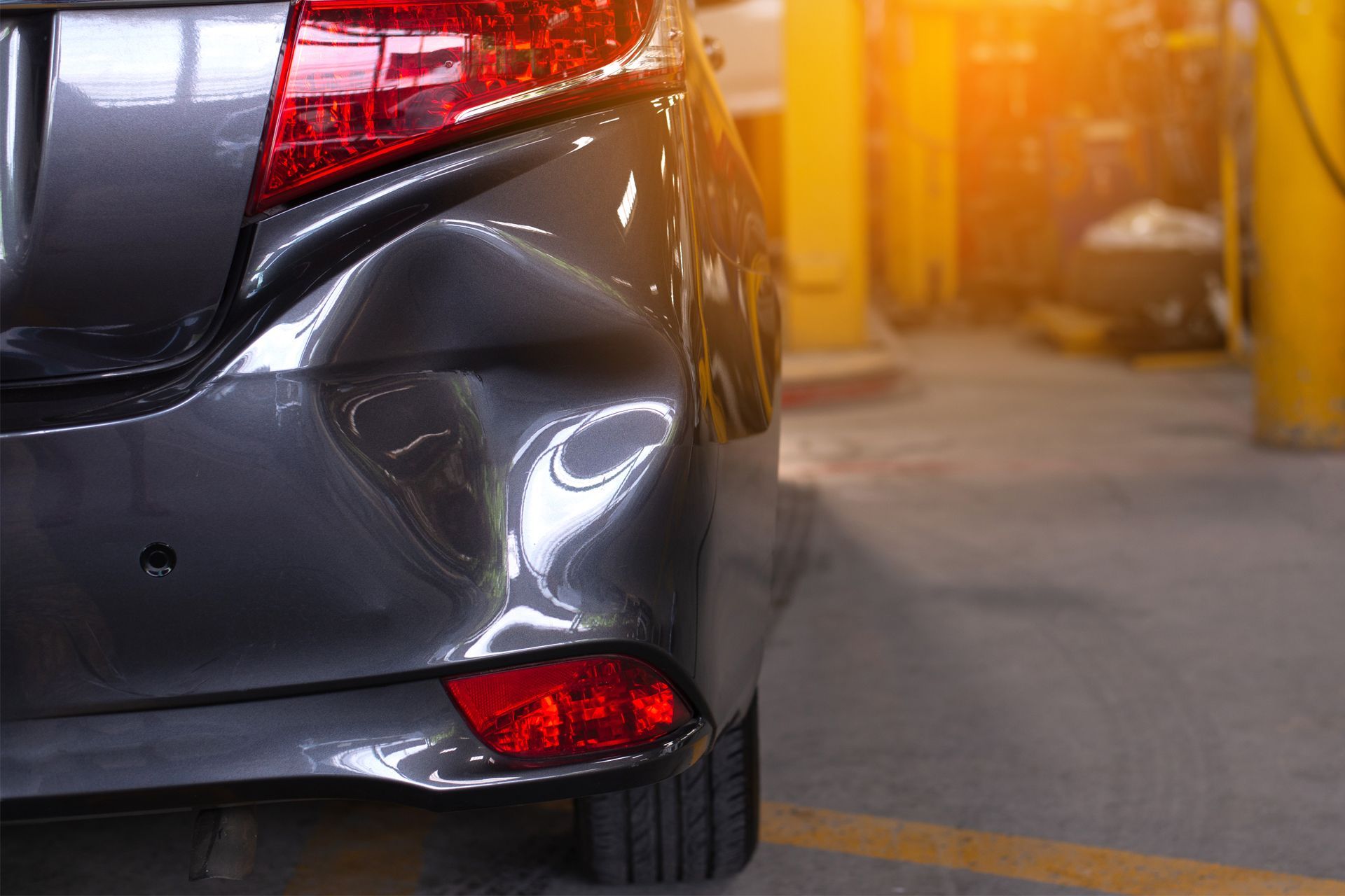 Dent on Car Rear Bumper