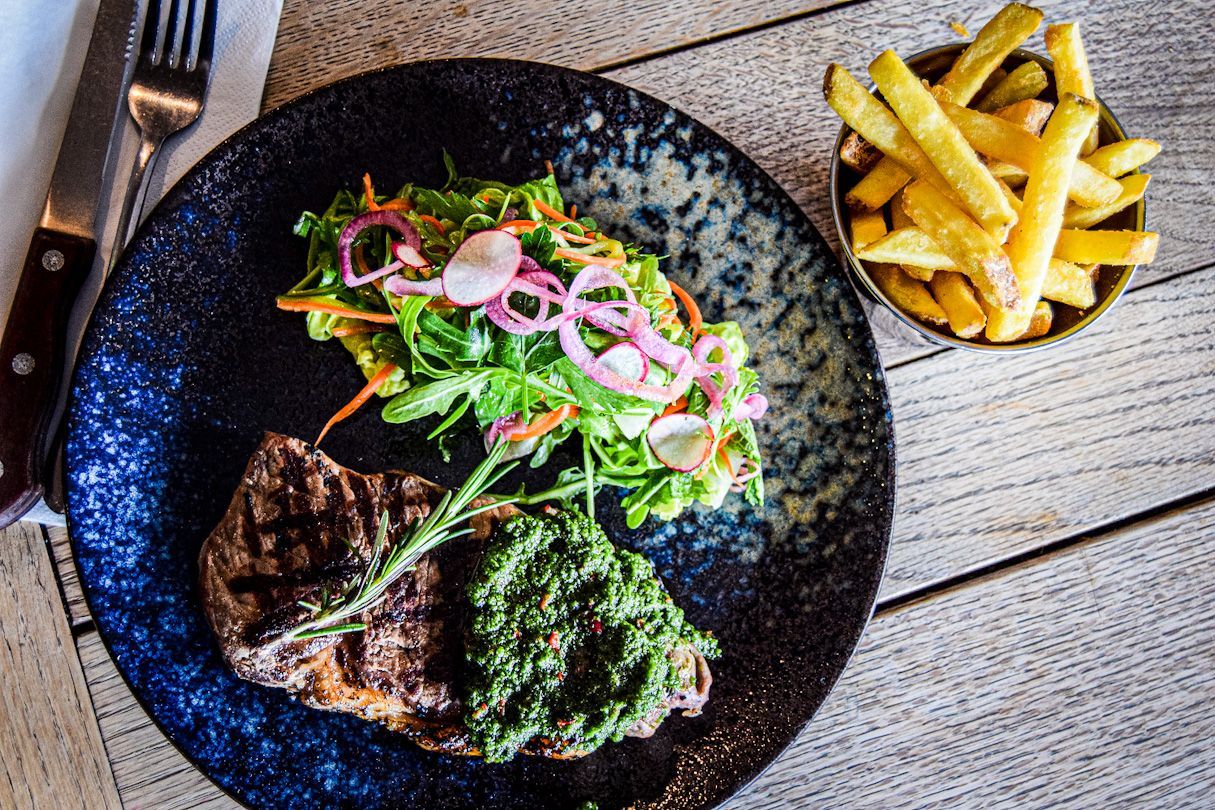 Exmouth steak, salad, salsa verde, and chips.