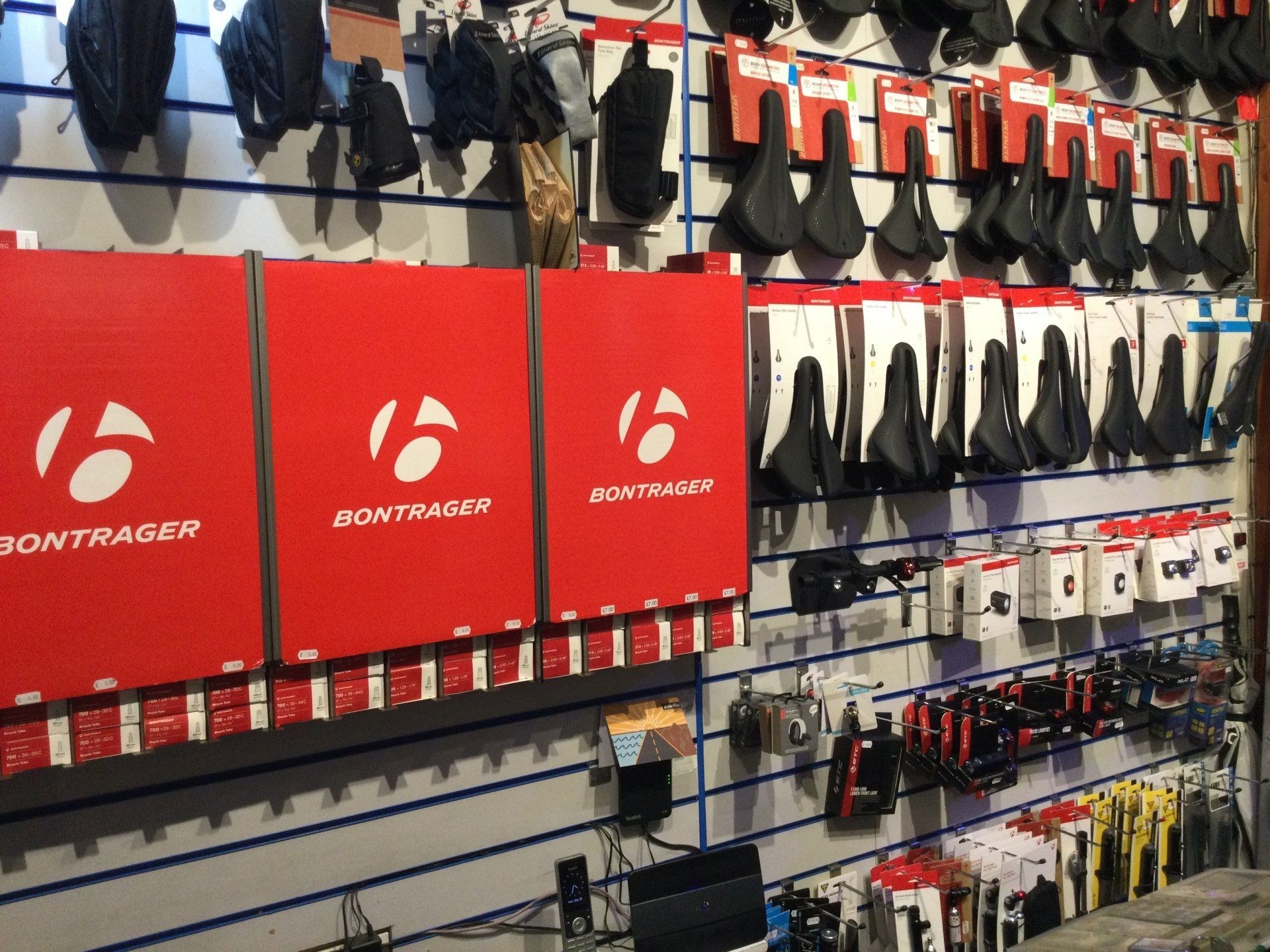 a bunch of bontrager products are displayed on a wall