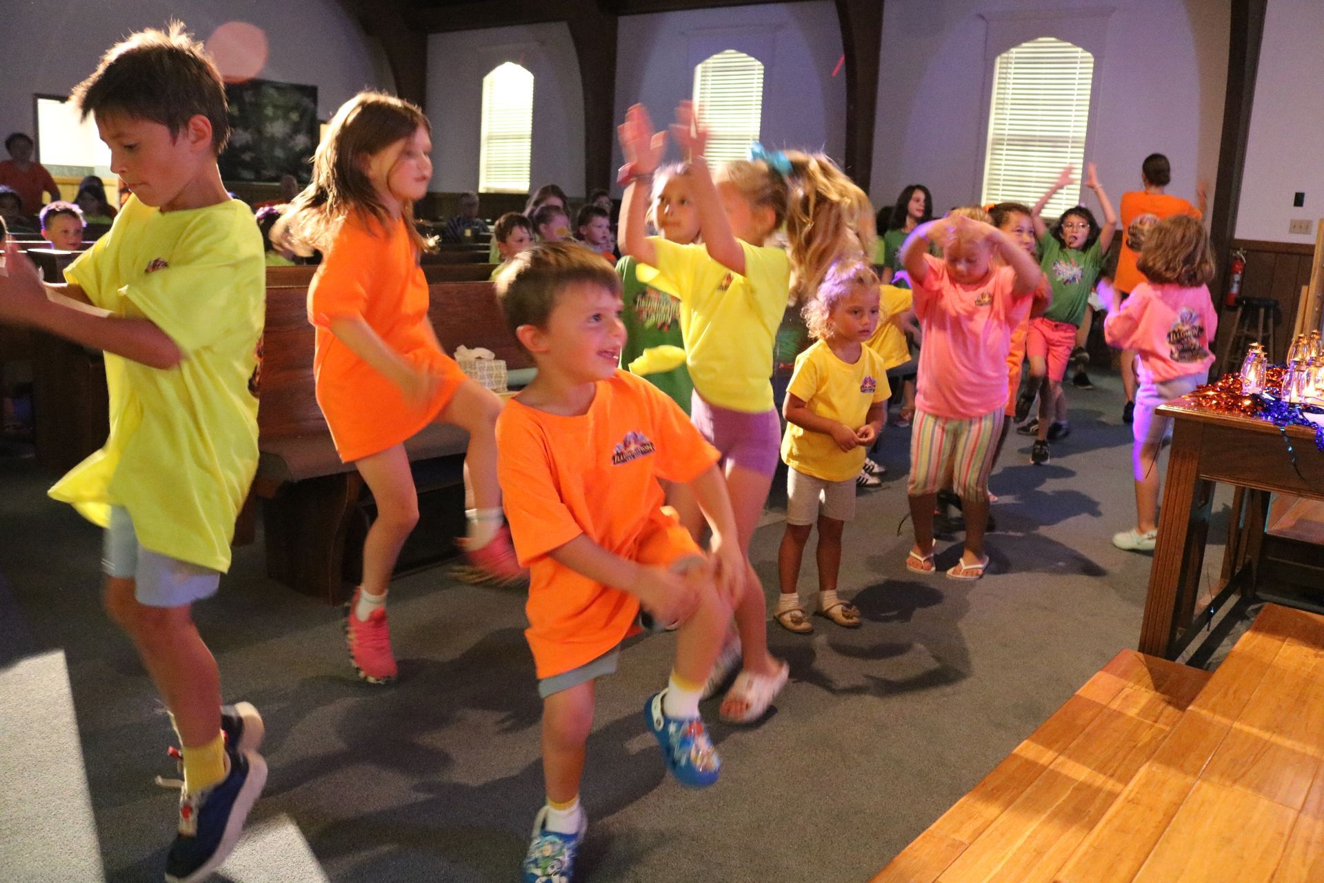 Children riding the purple train at a French Broad Valley Baptist Church kids event