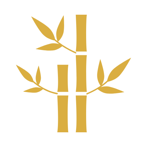 Goldener Bambusstängel mit Blättern.