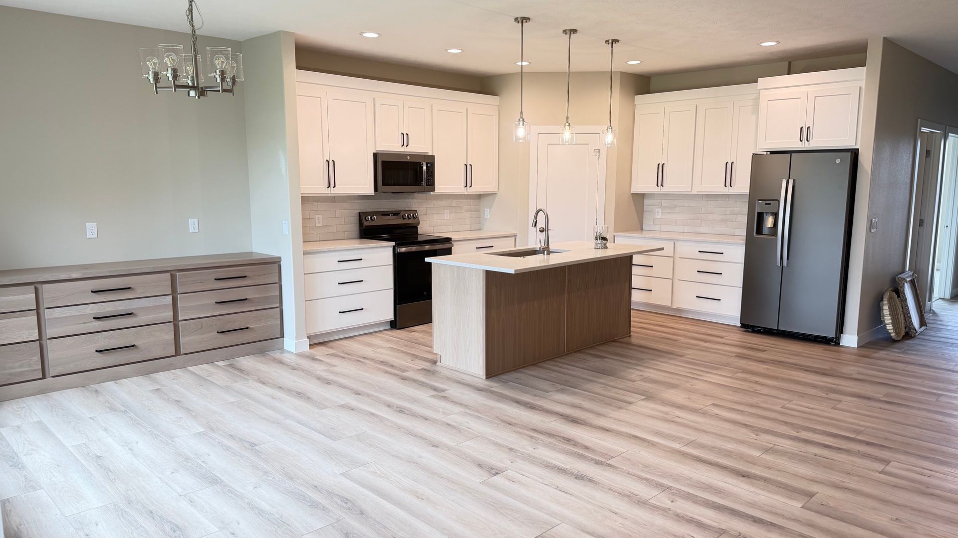 open-kitchen-dining-layout-twin-home-3306-prairie-wind-sioux-falls-joshua-homes