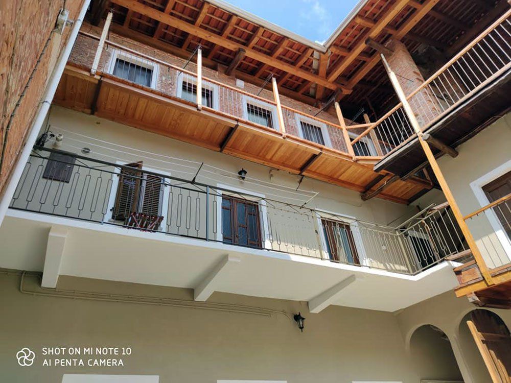 risultato imbiancatura facciata palazzo