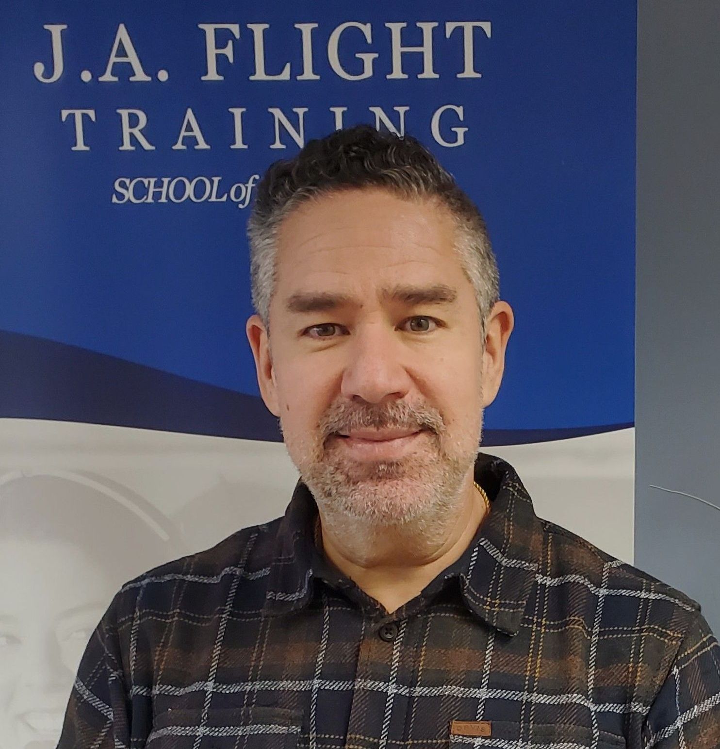 Headshot of Alex Garcia, instructor and CFIA/CFII at JA Flight Training.