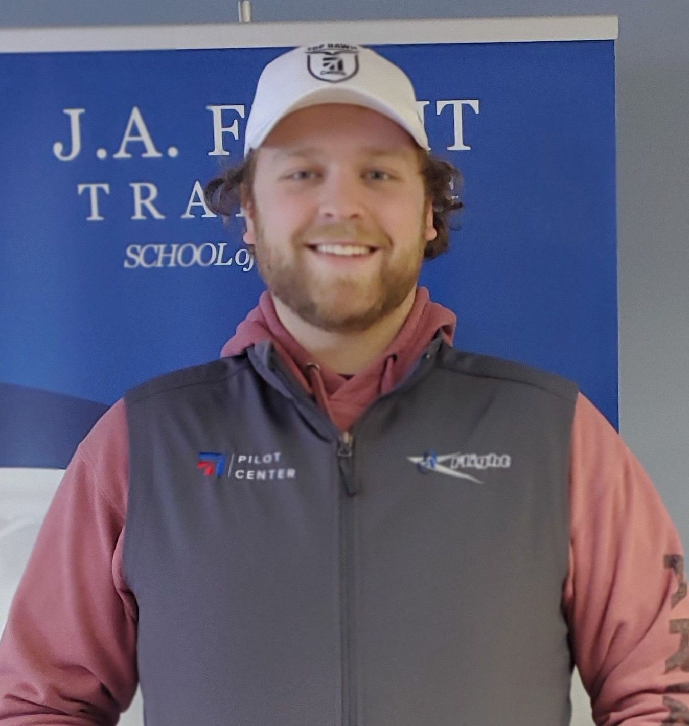 Headshot of Riley Andersen, instructor and CFIA/CFII at JA Flight Training.