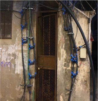 A door with a lot of wires hanging from it