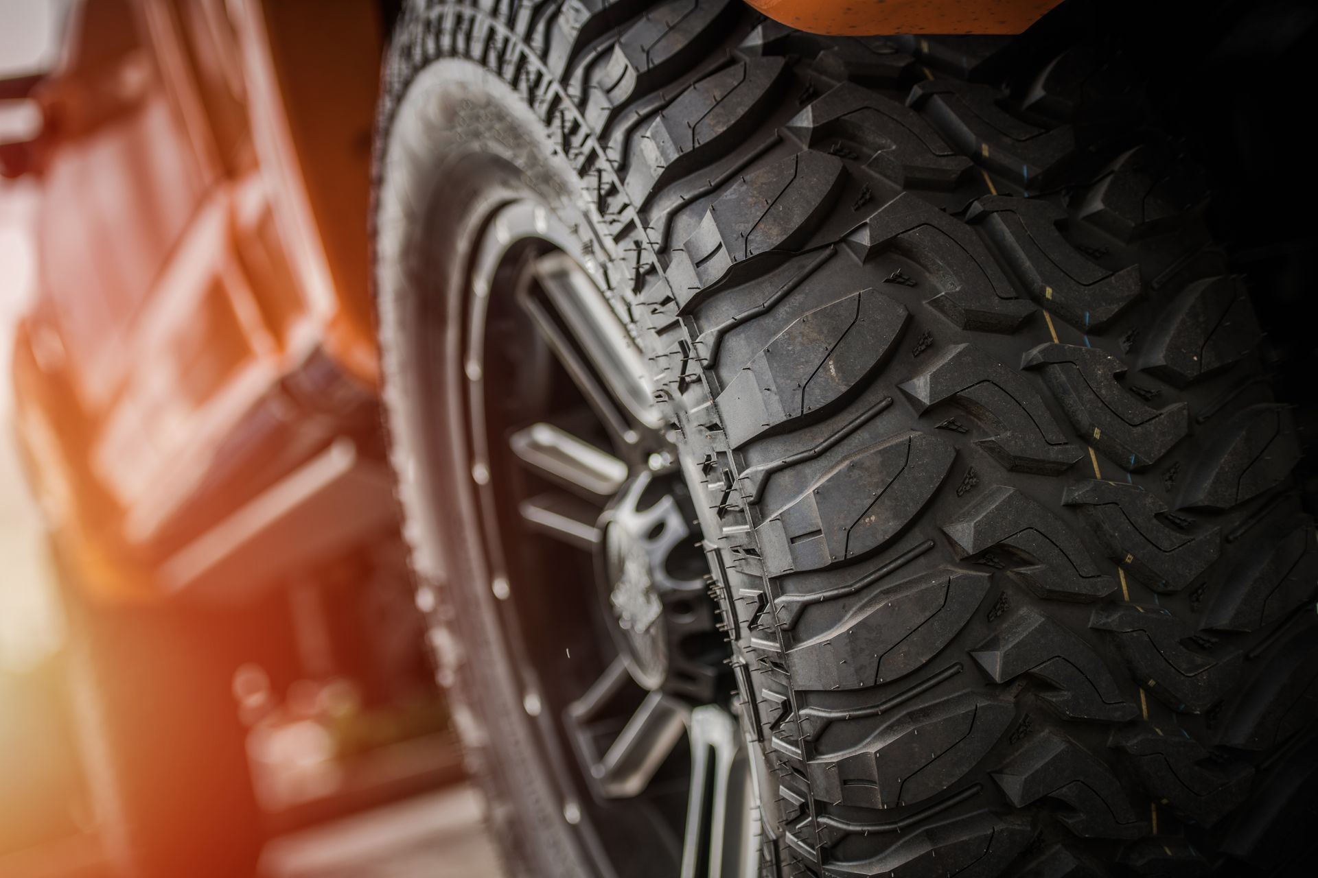 Close-up of an all-terrain tyre tread fitted to a 4WD.