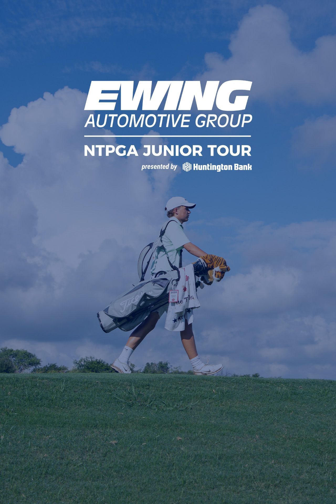 Golfer mid-swing on a course at dusk with “Ewing Automotive Group NTPGA Junior Tour” text