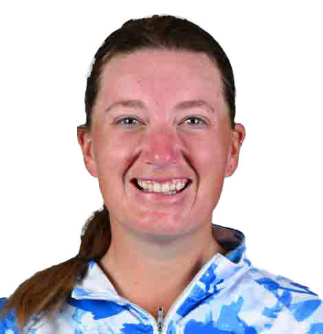Smiling person with ponytail wearing a blue-and-white patterned jacket on a white background
