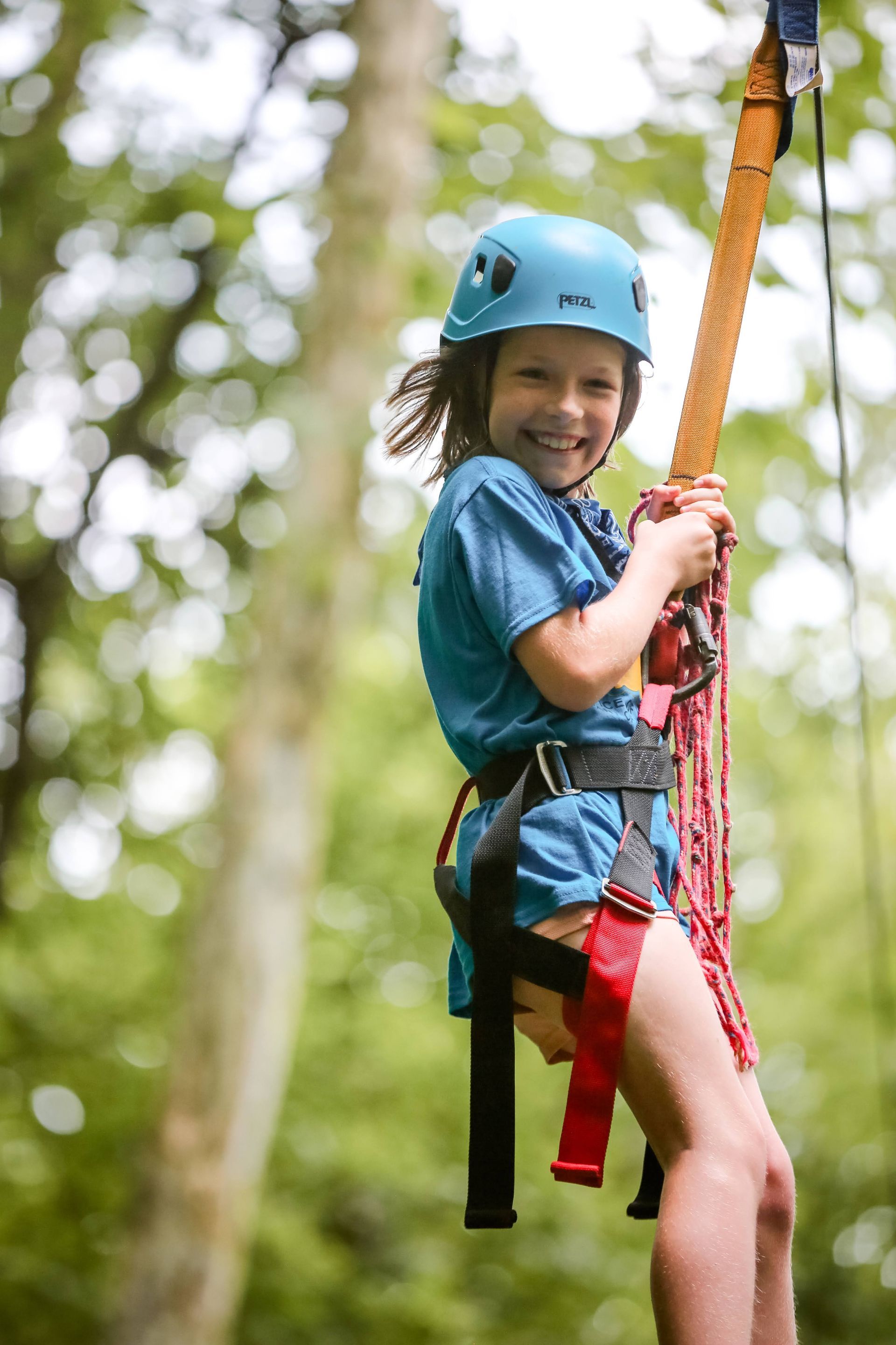 Camp Erin camper ziplining 