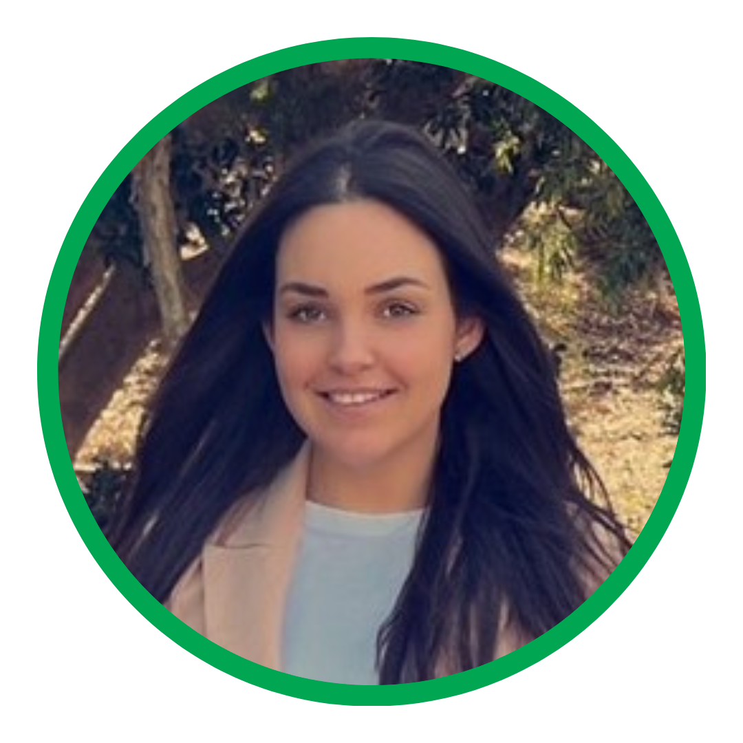 A woman with long dark hair is smiling in a green circle