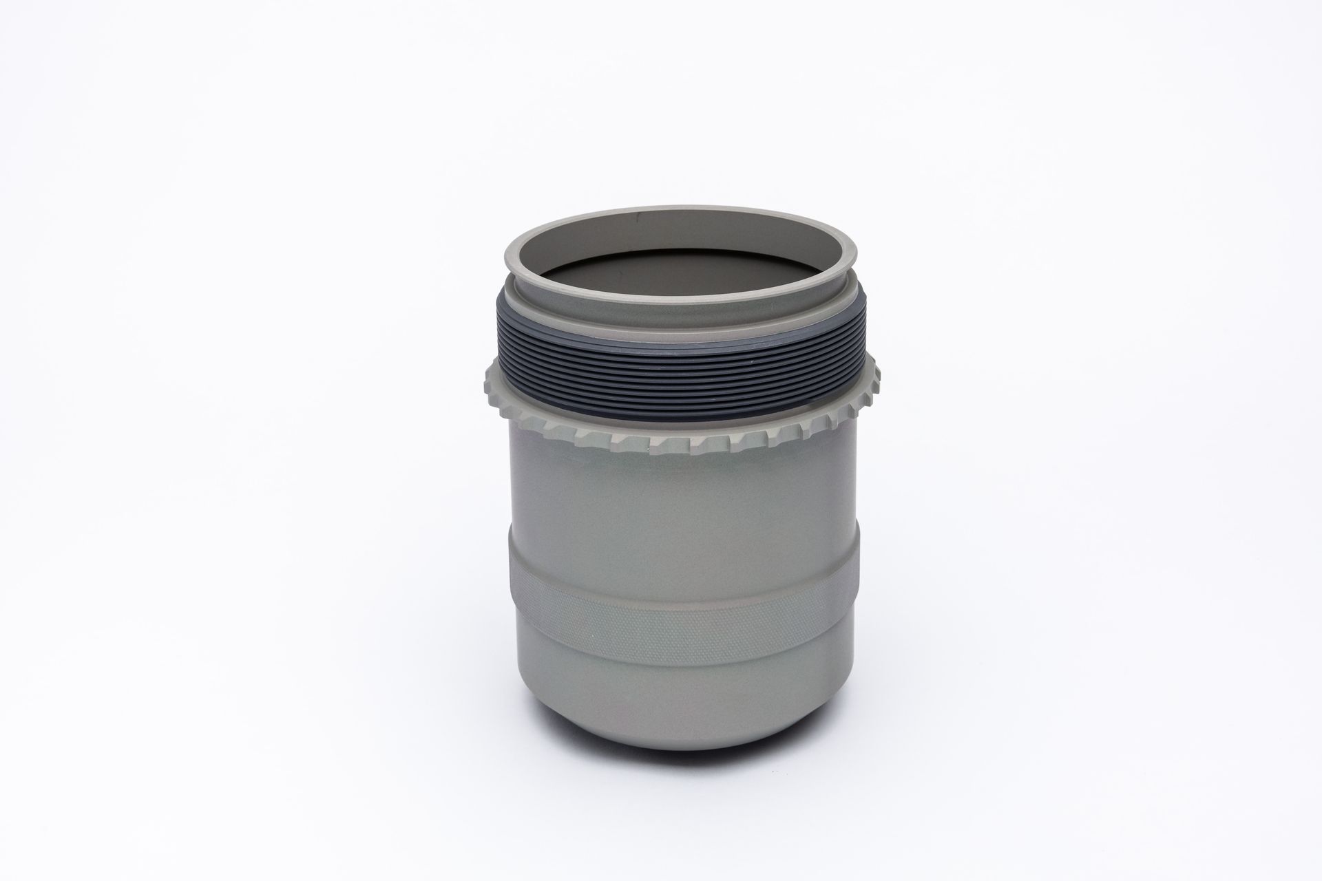 Gray plastic plumbing fitting with a textured rubber ring.