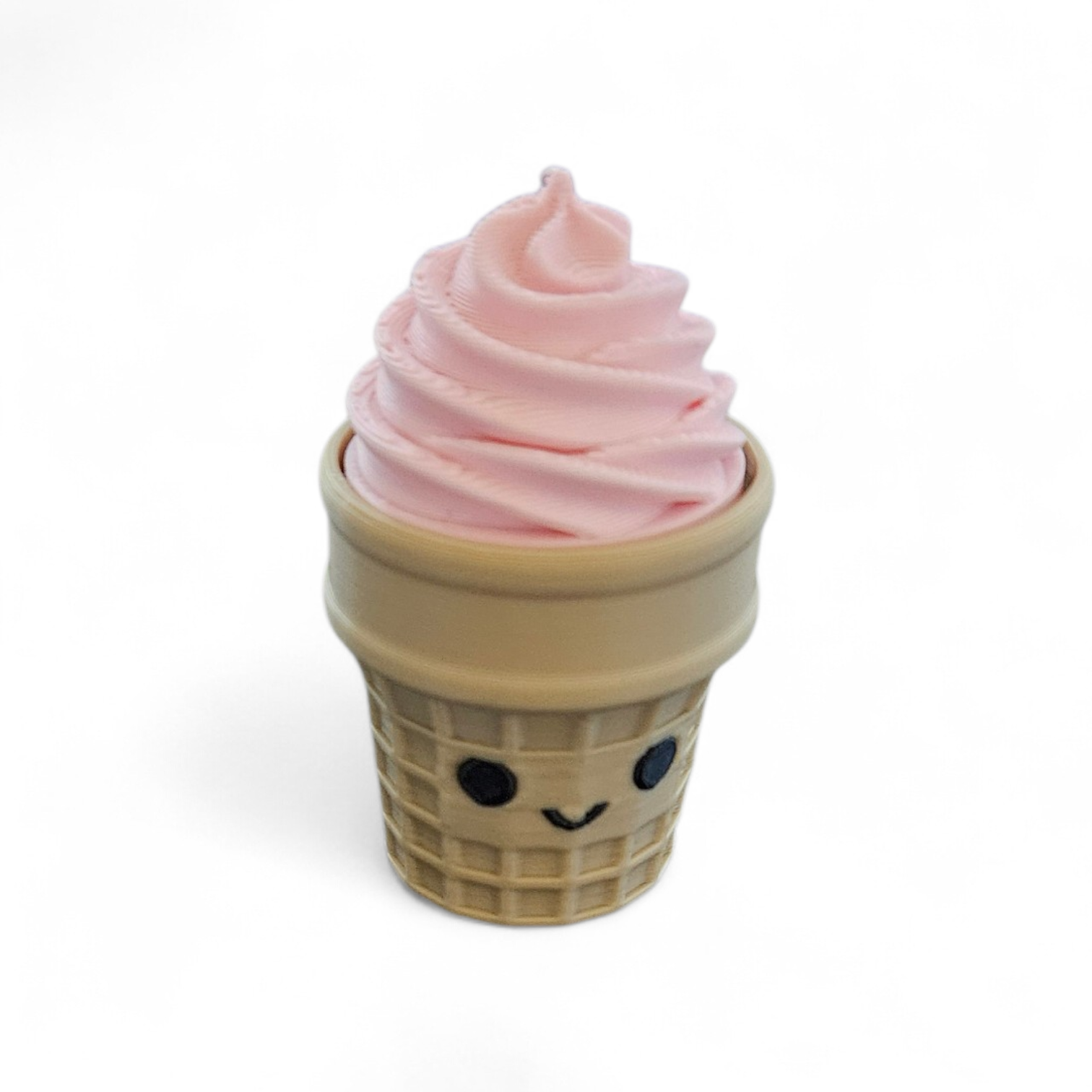 Pink soft-serve in a smiling waffle cone cup on a white background