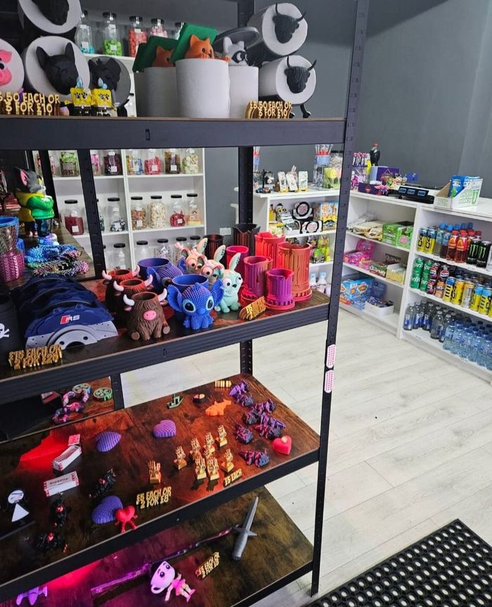 Shelves displaying colorful toys and figurines inside a store.