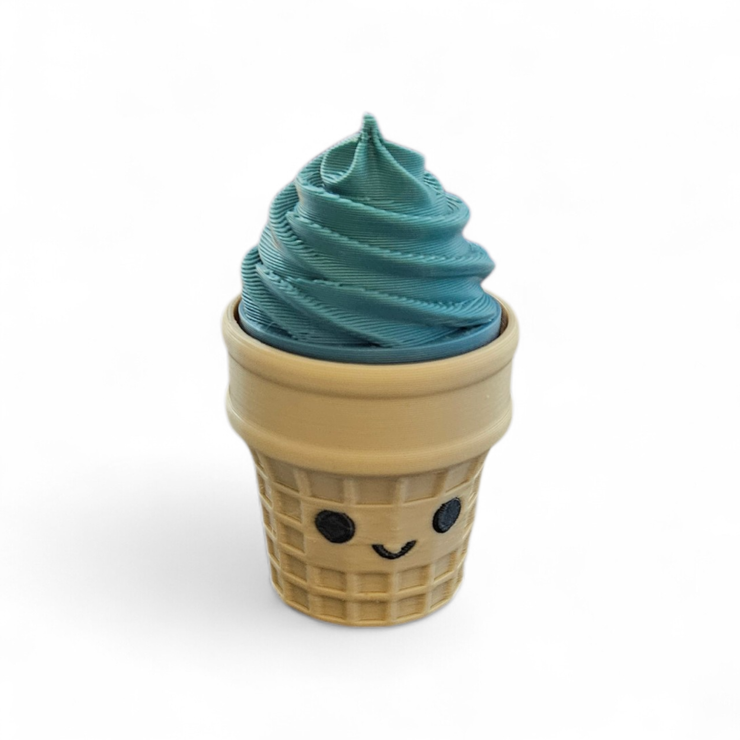 Cute waffle cone with teal swirl soft serve on a white background