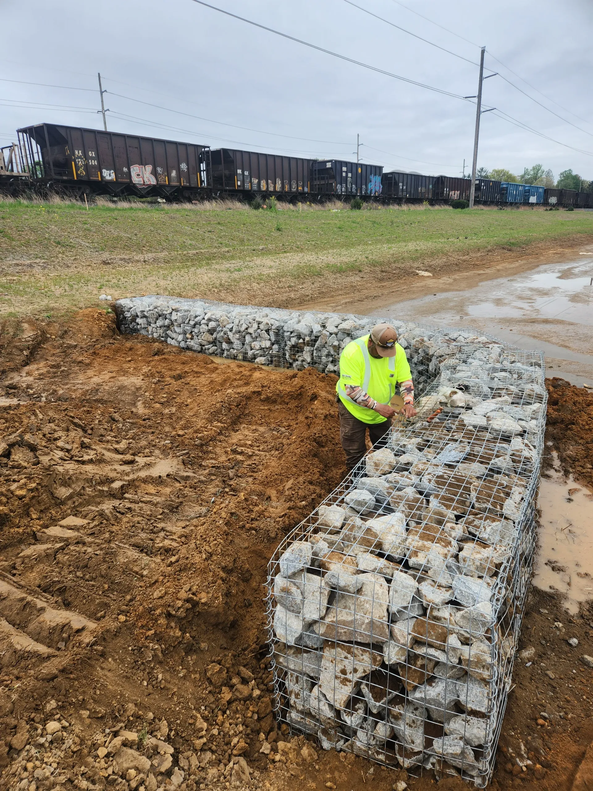 rock retaining wall installation at new residential development