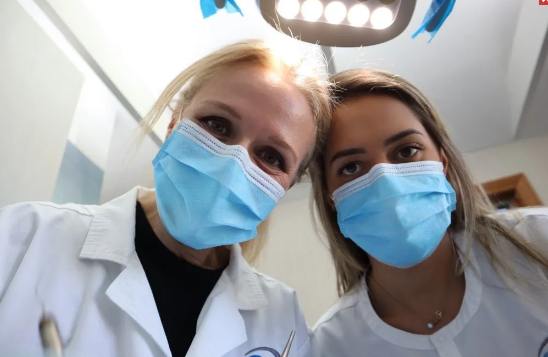 Dr. Nadia with staff member